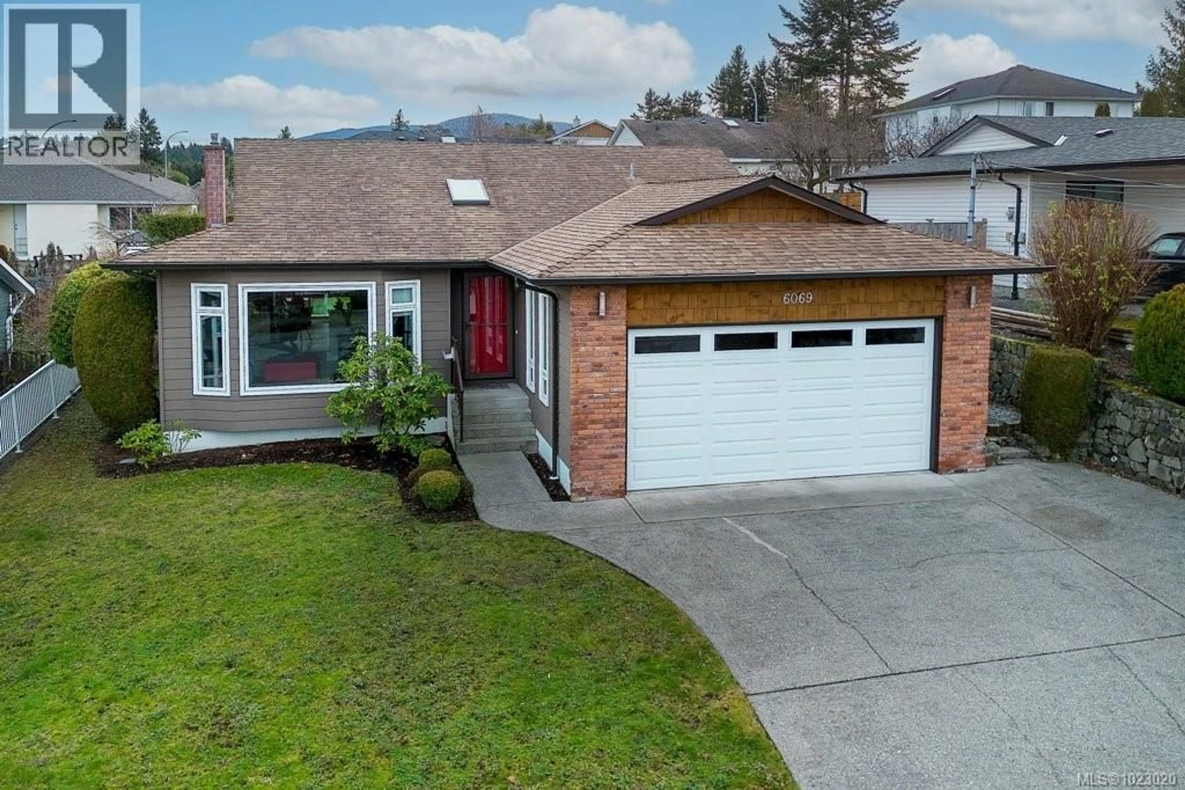 A pic from outside/outdoor area/front of a property/back of a property/a pic from drone, street for 6069 WALDBANK ROAD, Nanaimo British Columbia V9V1C7