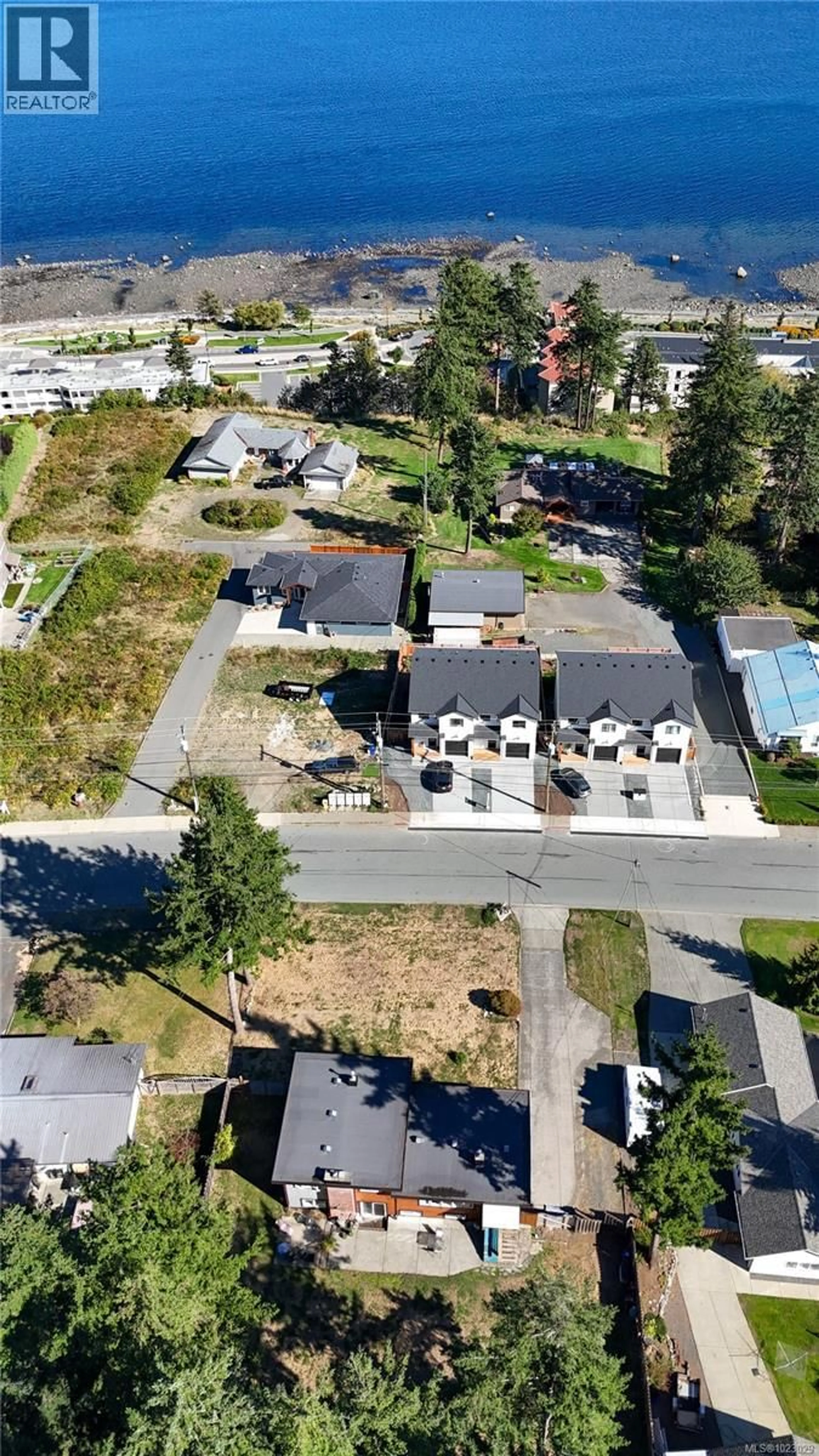 A pic from outside/outdoor area/front of a property/back of a property/a pic from drone, street for 1368 GALERNO ROAD, Campbell River British Columbia V9W1J9
