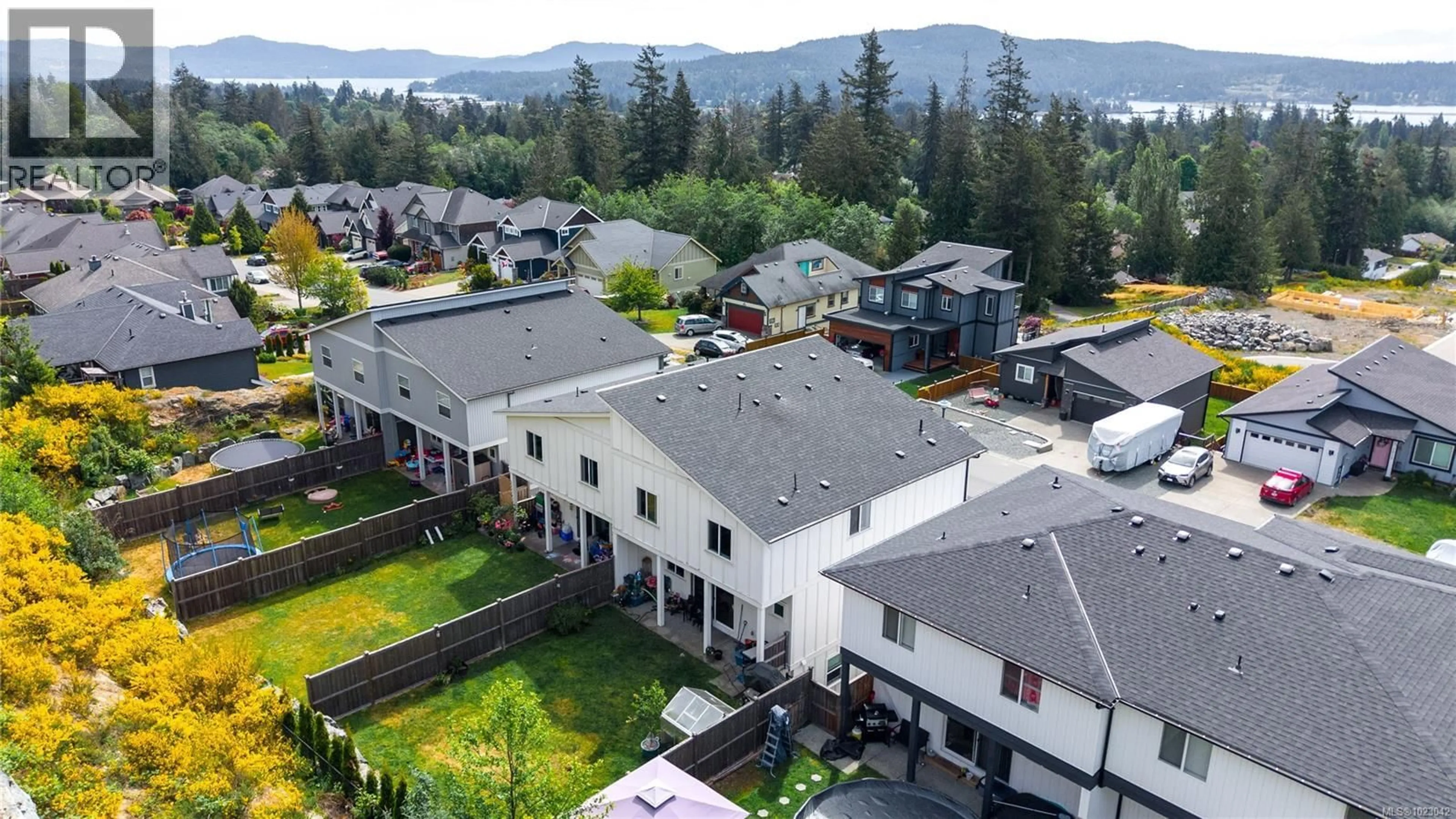 A pic from outside/outdoor area/front of a property/back of a property/a pic from drone, mountain view for 7010 BRAILSFORD PLACE, Sooke British Columbia V9Z1J7
