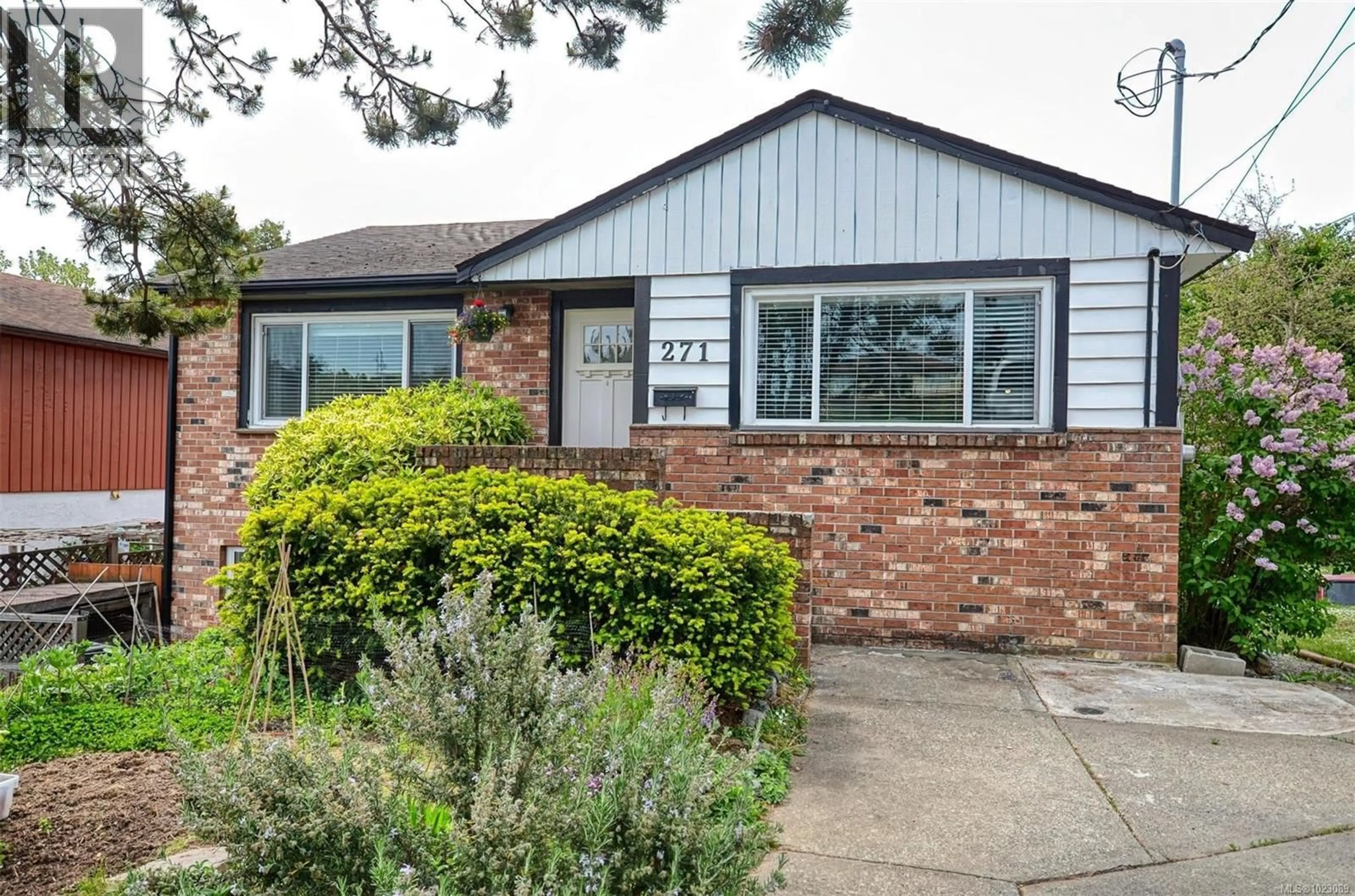 Home with brick exterior material, street for 271 BATTLEFORD AVENUE, Saanich British Columbia V8Z1K7