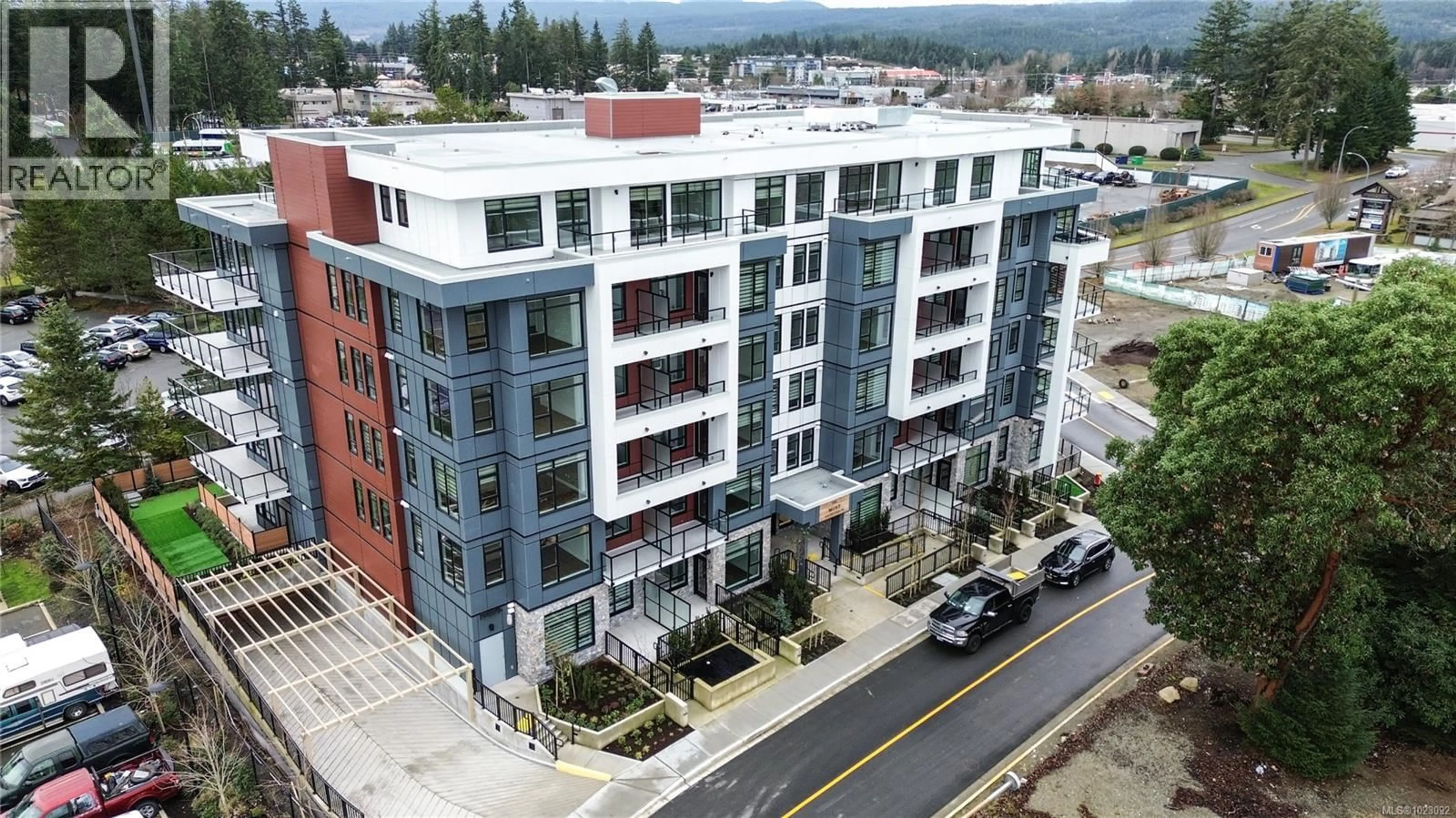 A pic from outside/outdoor area/front of a property/back of a property/a pic from drone, building for 407 - 6320 SENTINAL DRIVE, Nanaimo British Columbia V9V1W4