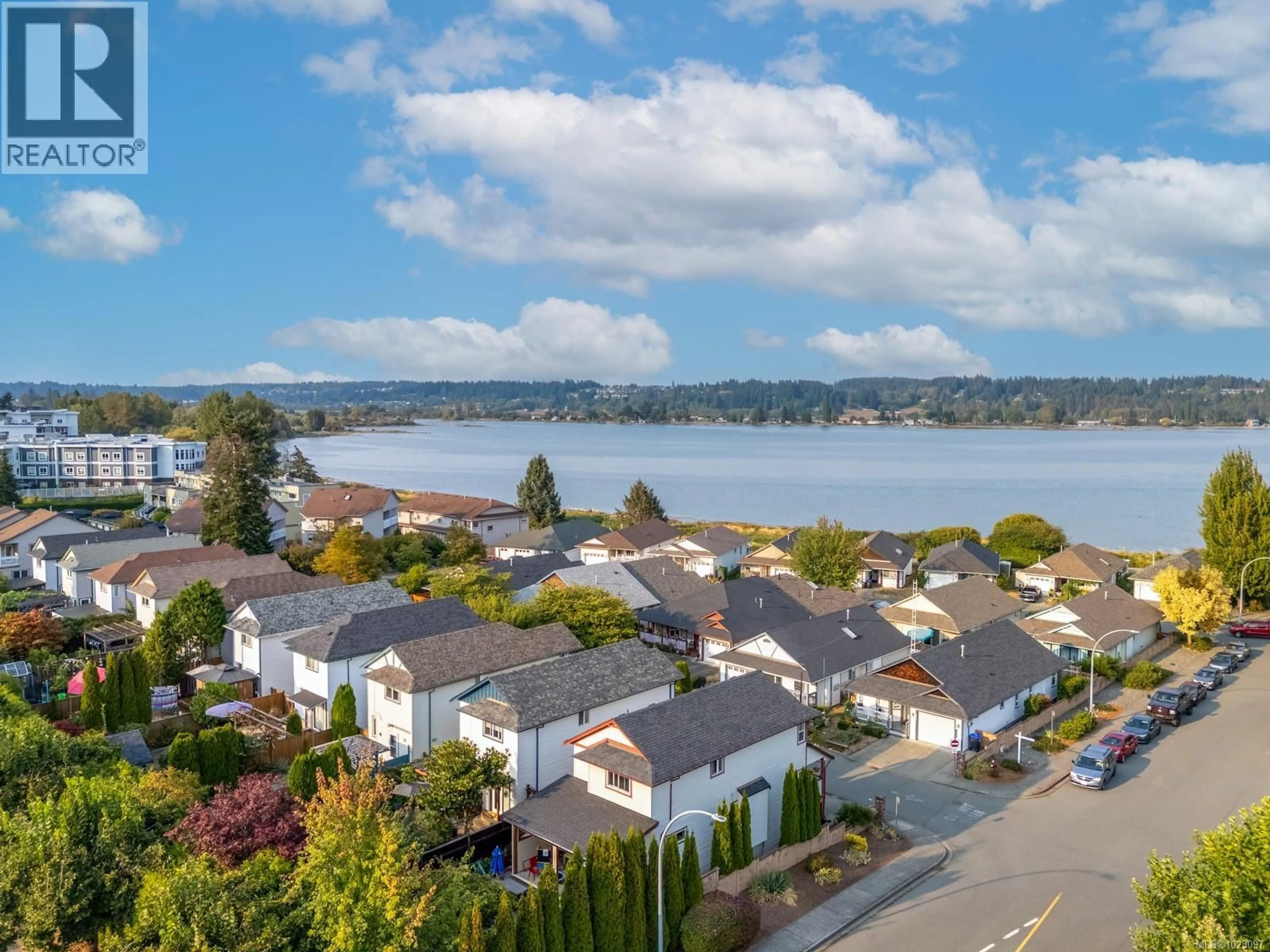 A pic from outside/outdoor area/front of a property/back of a property/a pic from drone, water/lake/river/ocean view for 168 - 202 31ST STREET, Courtenay British Columbia V9N7T8