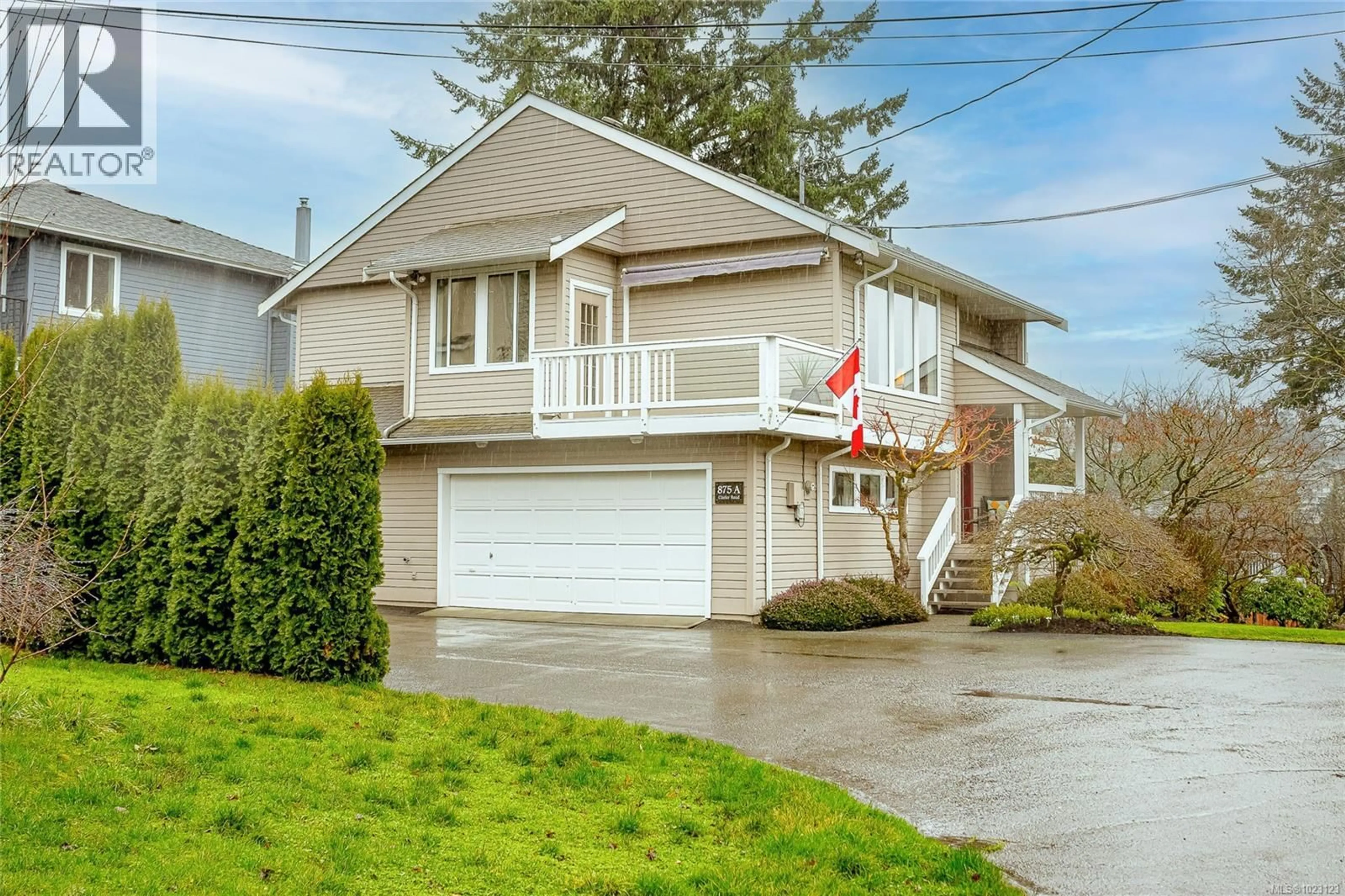 Home with vinyl exterior material, street for 875 CLARKE ROAD, Central Saanich British Columbia V8M2G1