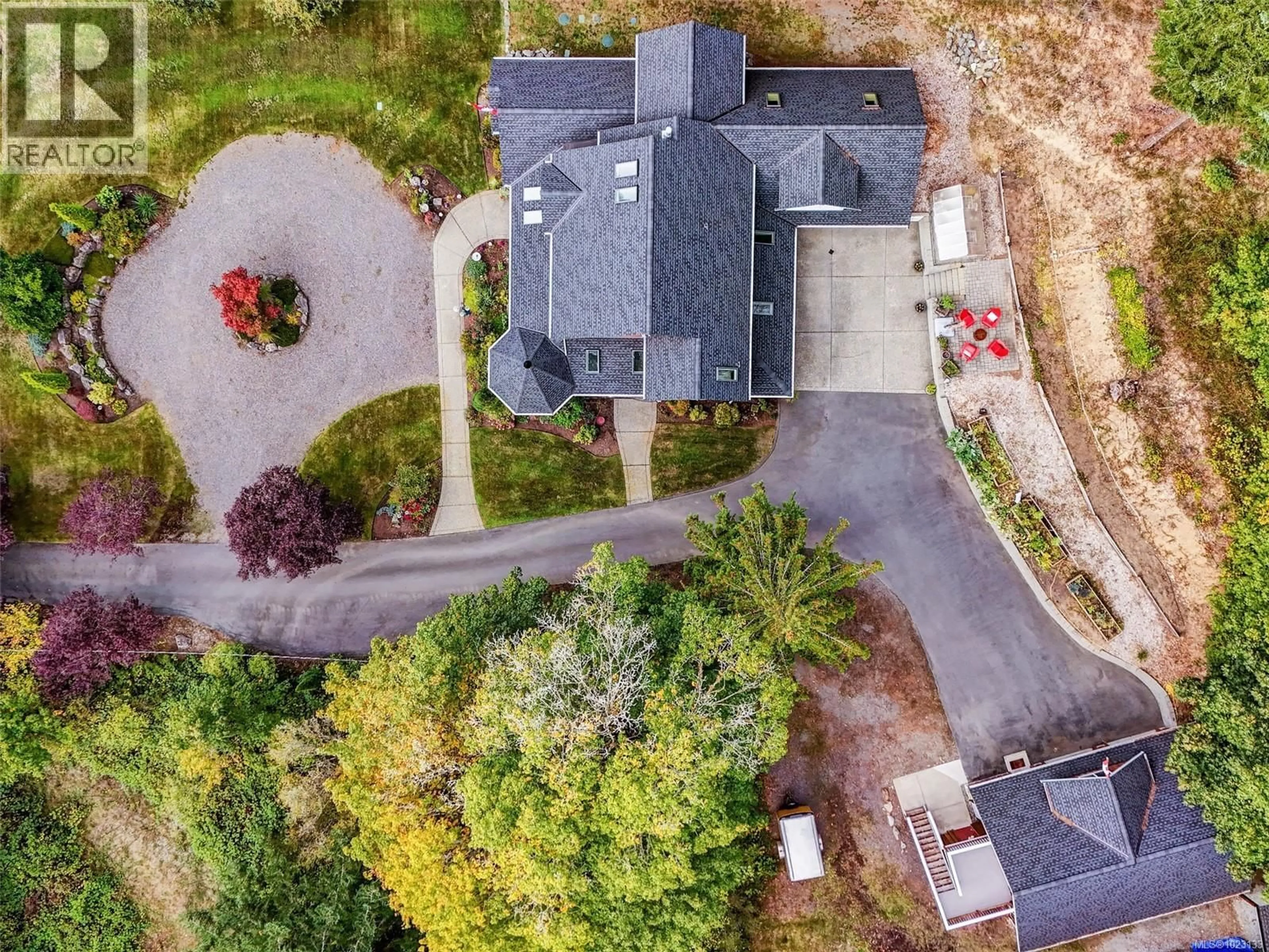 A pic from outside/outdoor area/front of a property/back of a property/a pic from drone, street for 6583 WALLACE DRIVE, Central Saanich British Columbia V8M1J8