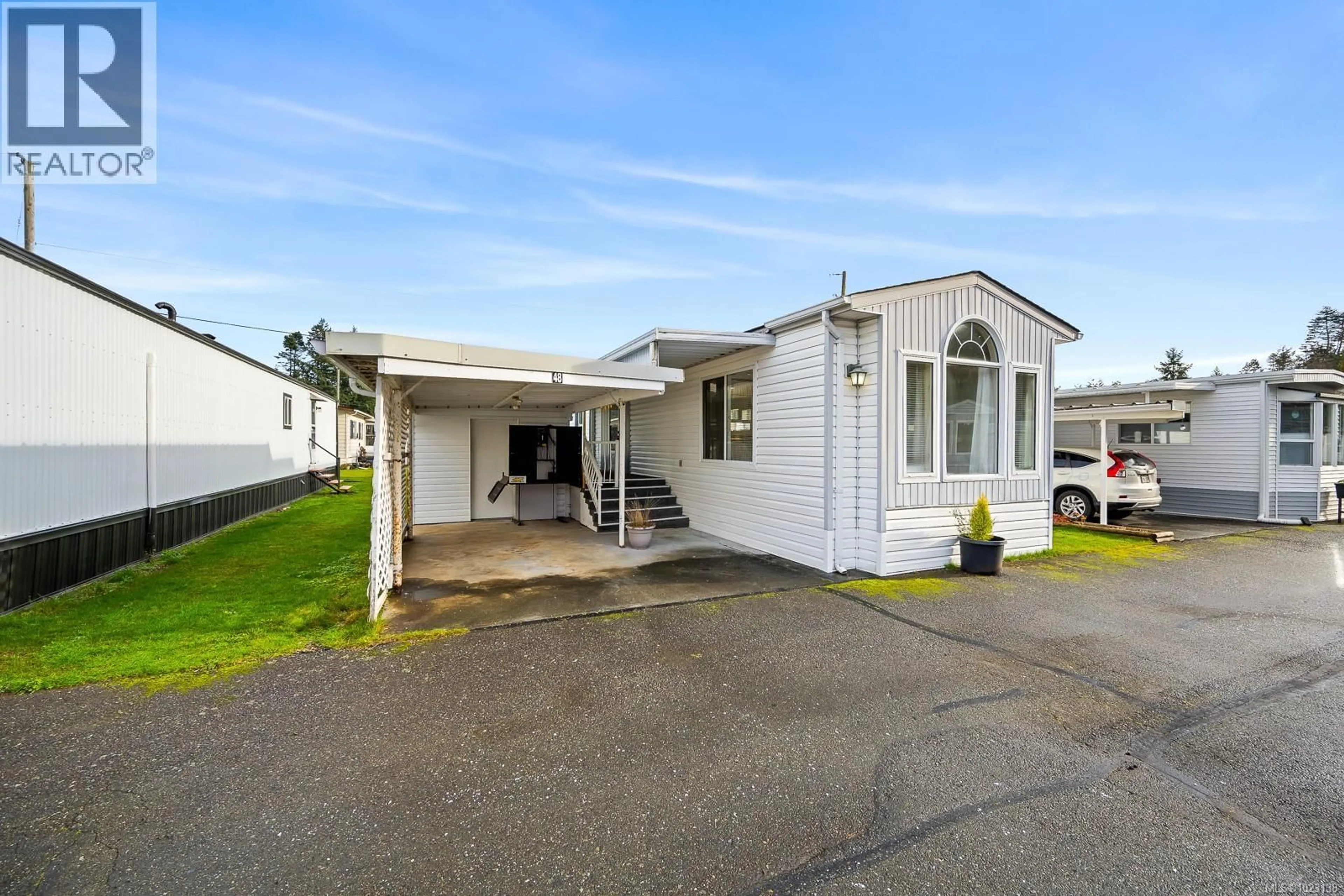 Home with vinyl exterior material, street for 48 - 1240 WILKINSON ROAD, Comox British Columbia V9M3X8