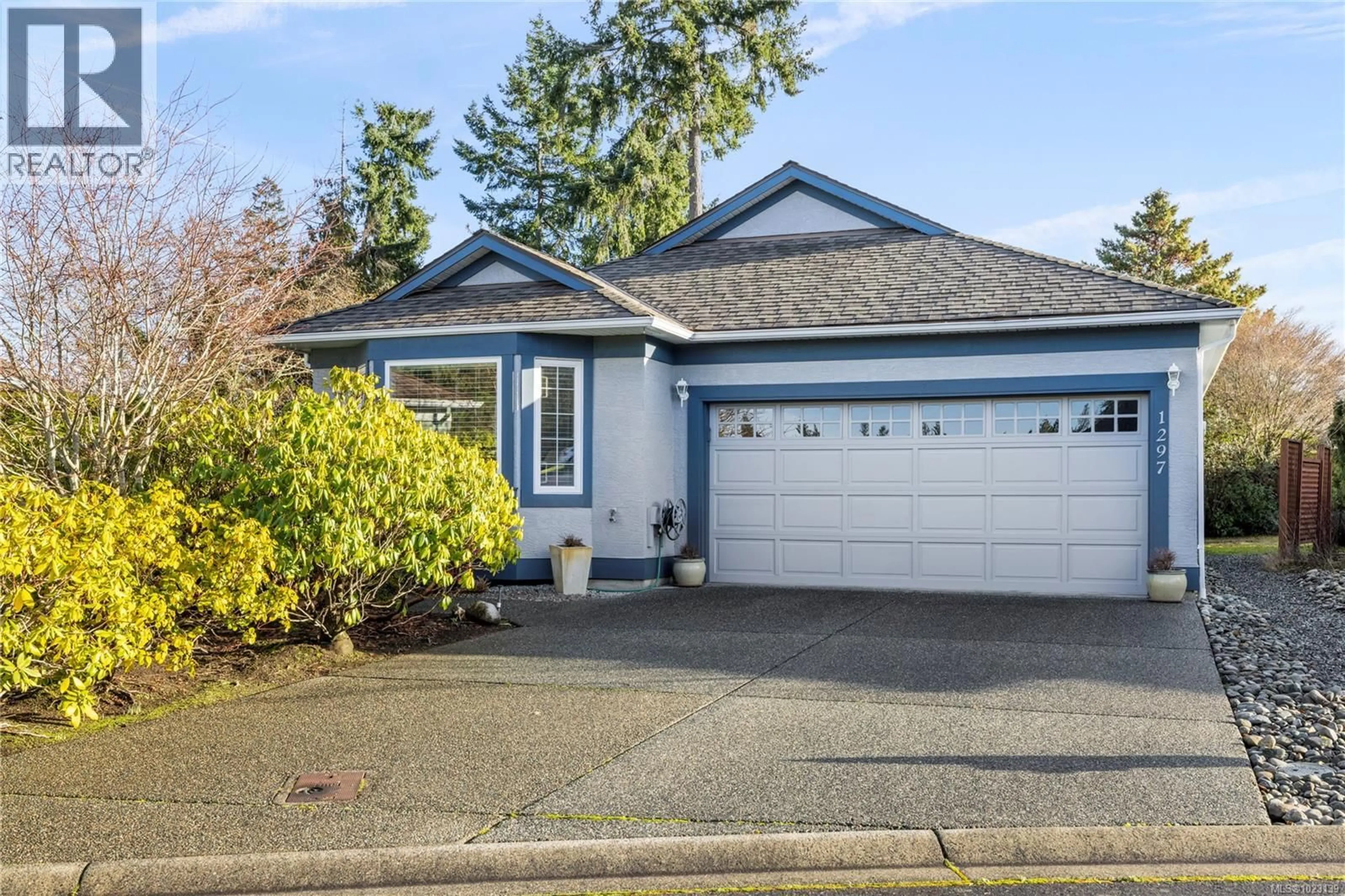 Home with vinyl exterior material, street for 1297 OCEANSIDE DRIVE, Qualicum Beach British Columbia V9K2K4