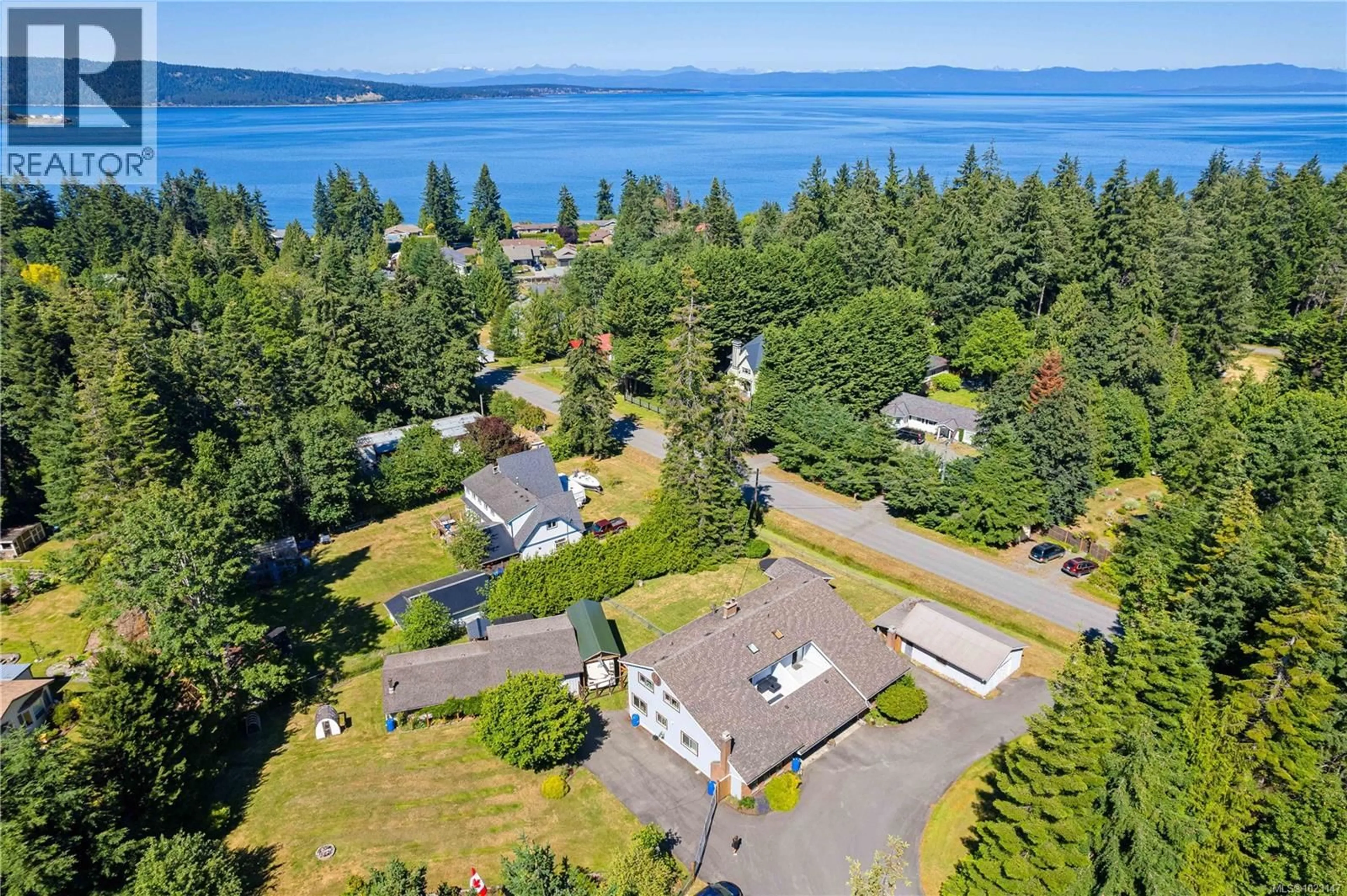 A pic from outside/outdoor area/front of a property/back of a property/a pic from drone, water/lake/river/ocean view for A & B - 153 BALD EAGLE CRESCENT, Bowser British Columbia V0R1G0