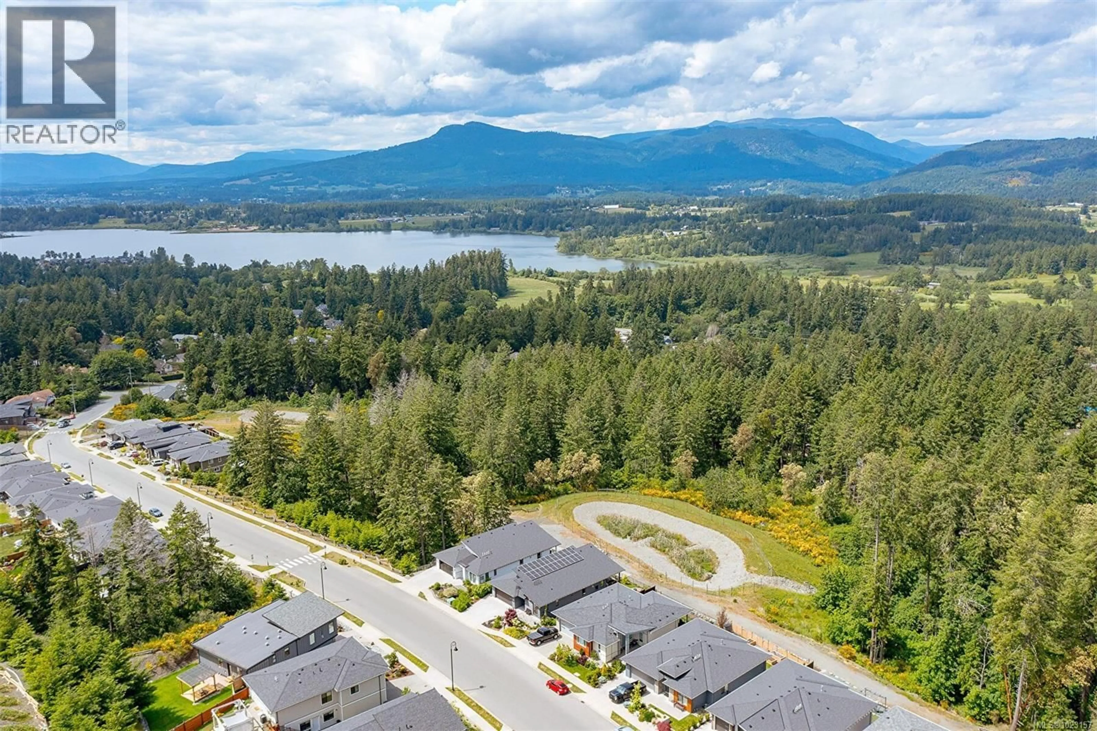 A pic from outside/outdoor area/front of a property/back of a property/a pic from drone, mountain view for 6257 HIGHWOOD DRIVE, Duncan British Columbia V9L0H5