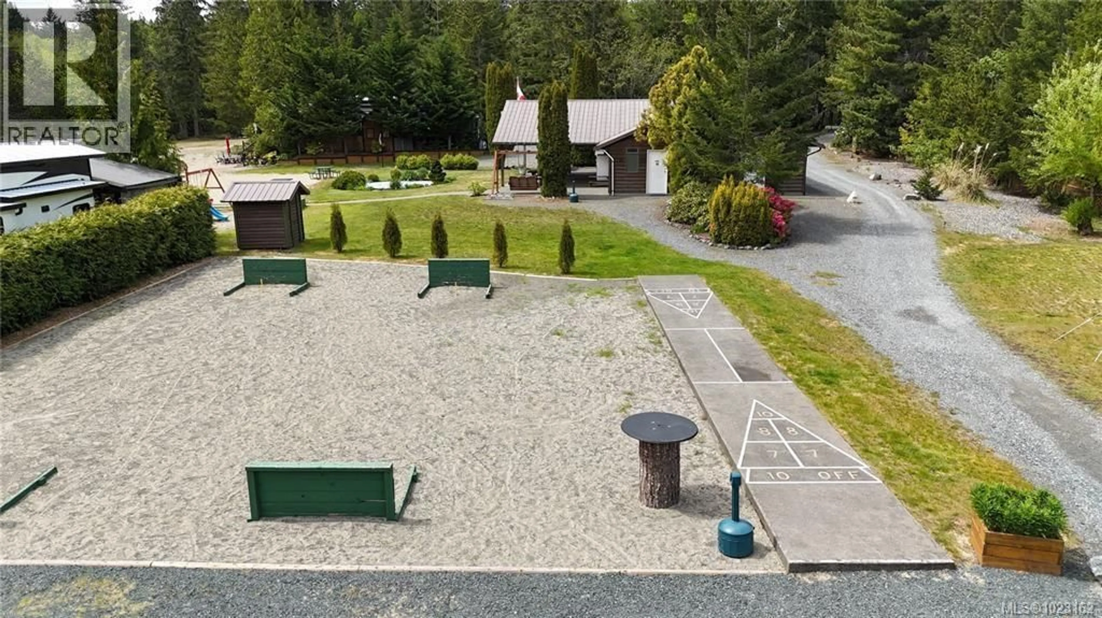 A pic from outside/outdoor area/front of a property/back of a property/a pic from drone, street for E5 - 2650 TURNBULL ROAD, Qualicum Beach British Columbia V9K2R2