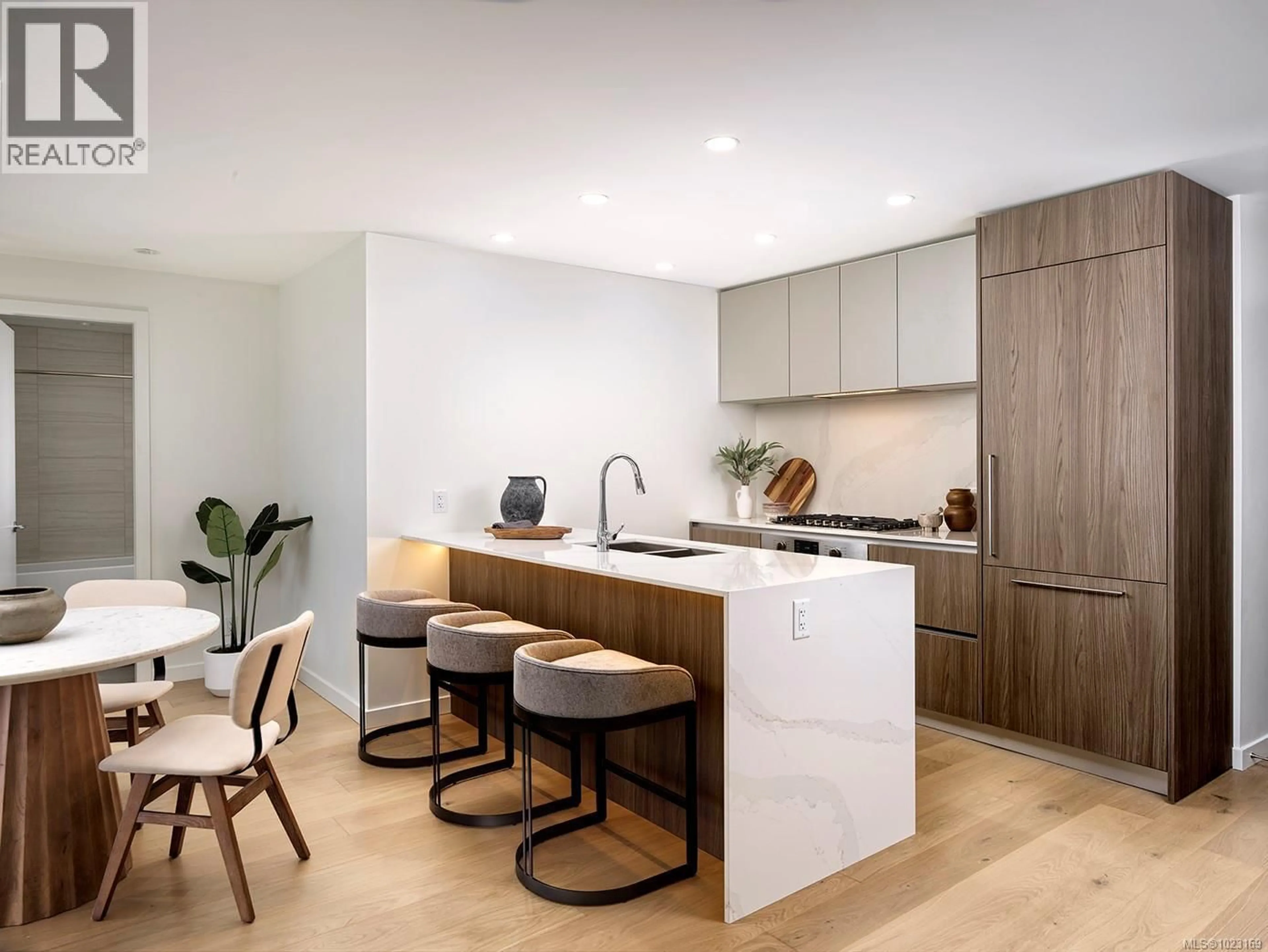 Contemporary kitchen, wood/laminate floor for 907 - 2000 HANNINGTON ROAD, Langford British Columbia V9B6R6