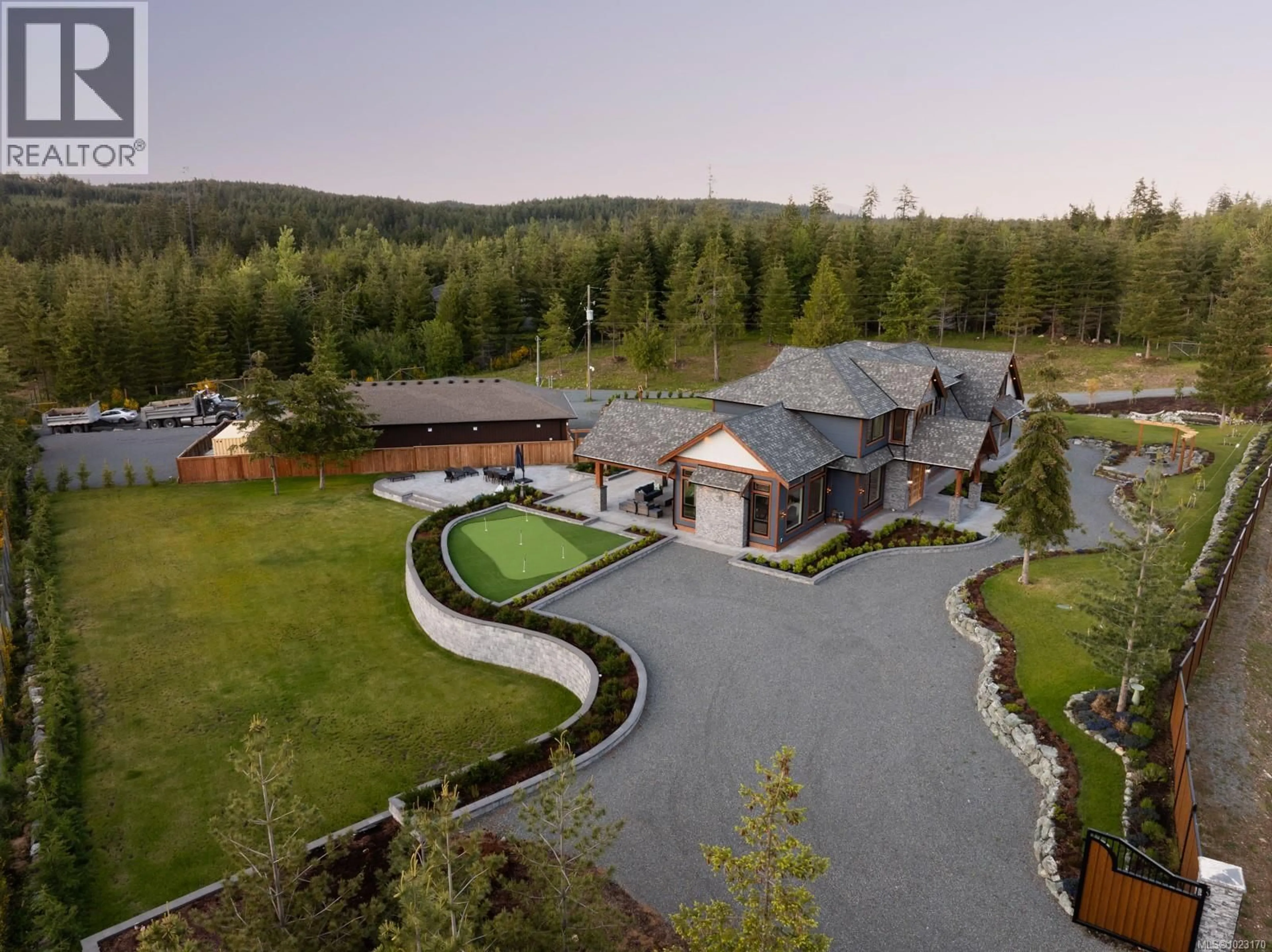 A pic from outside/outdoor area/front of a property/back of a property/a pic from drone, mountain view for 2833 WOODCROFT PLACE, Shawnigan Lake British Columbia V8H2E4