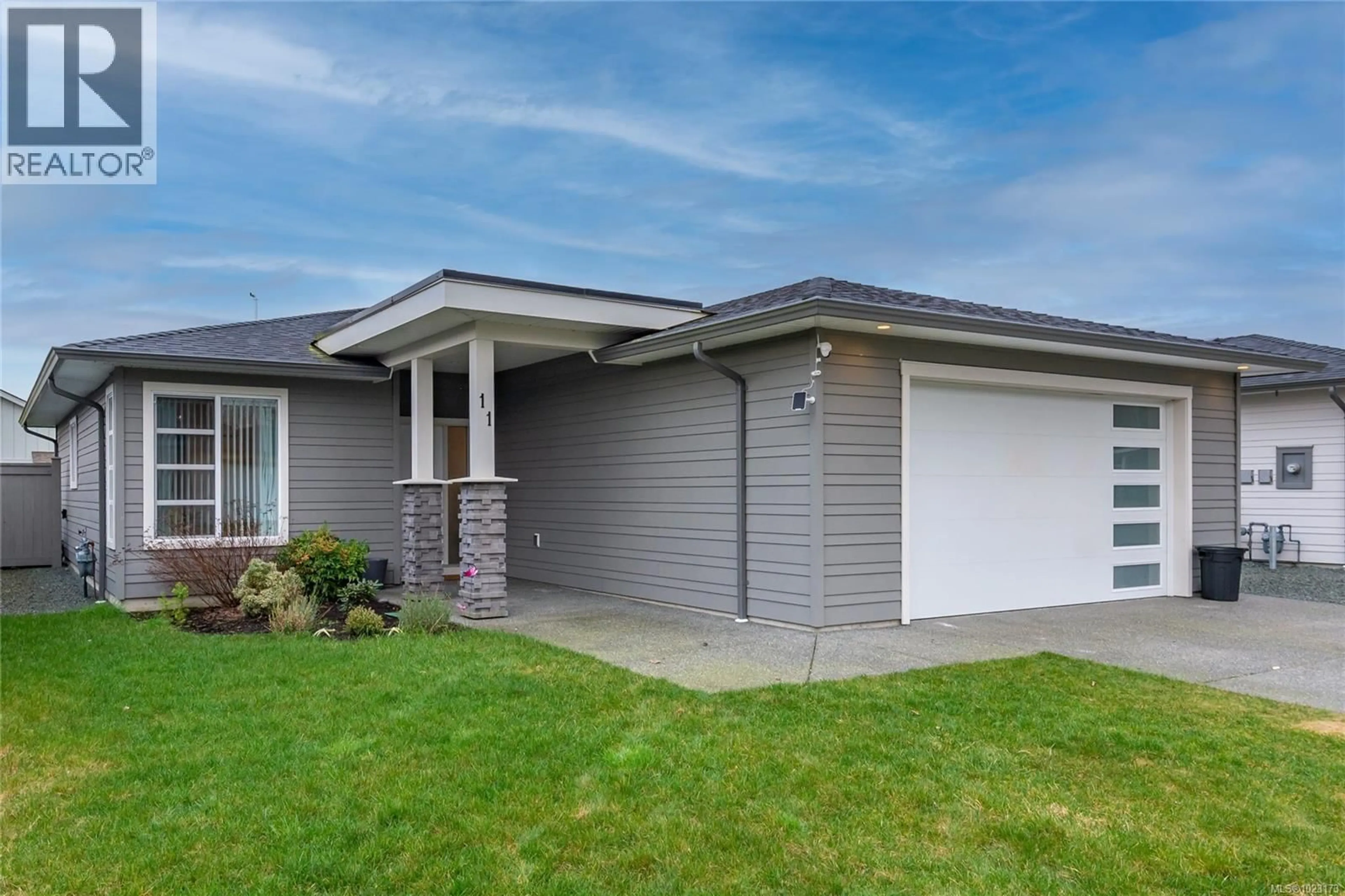 Home with vinyl exterior material, street for 11 - 2161 EVERGREEN ROAD, Campbell River British Columbia V9W0C8