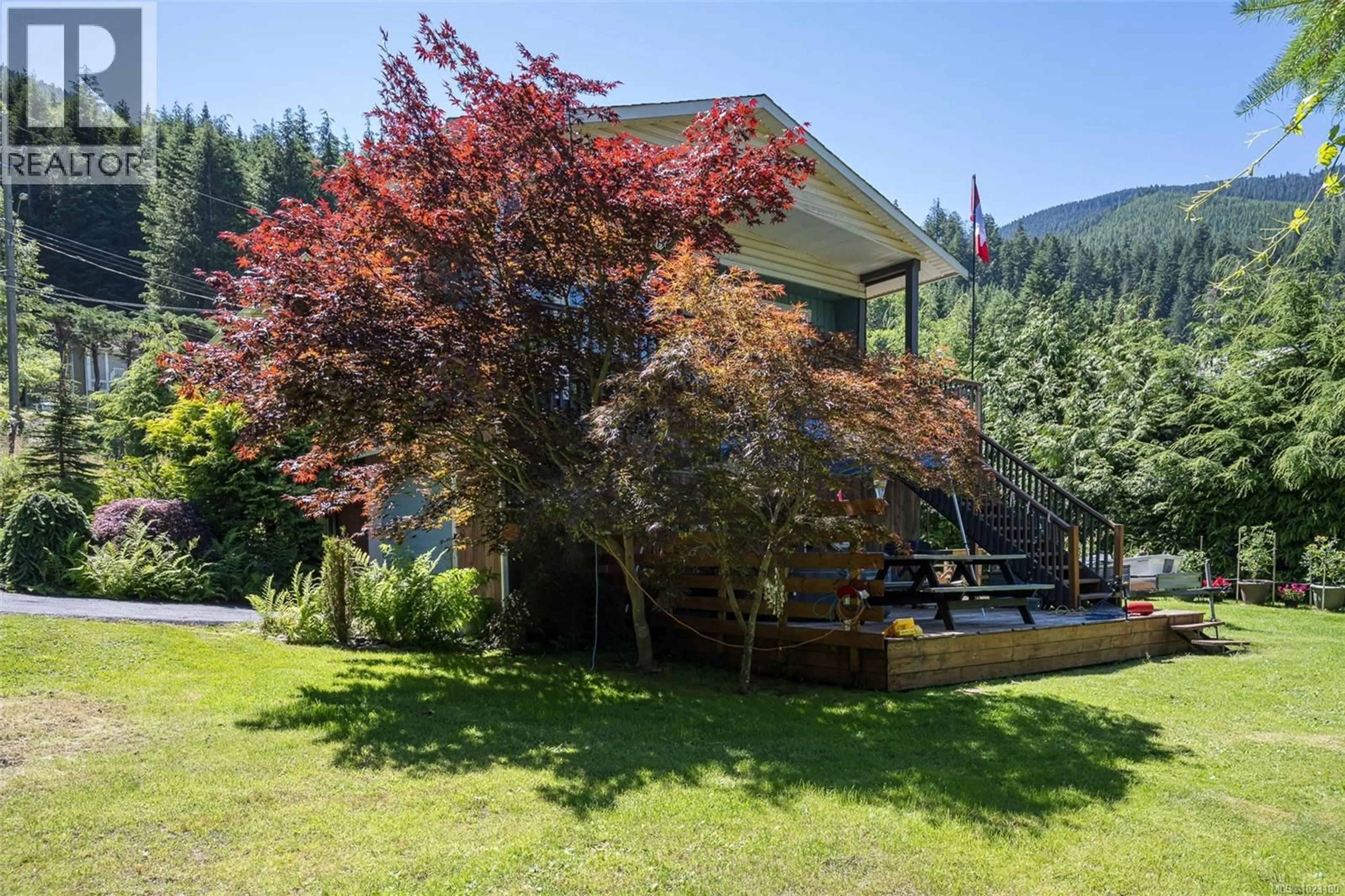 A pic from outside/outdoor area/front of a property/back of a property/a pic from drone, forest/trees view for 561 MCMILLAN DRIVE, Sayward British Columbia V0P1R0