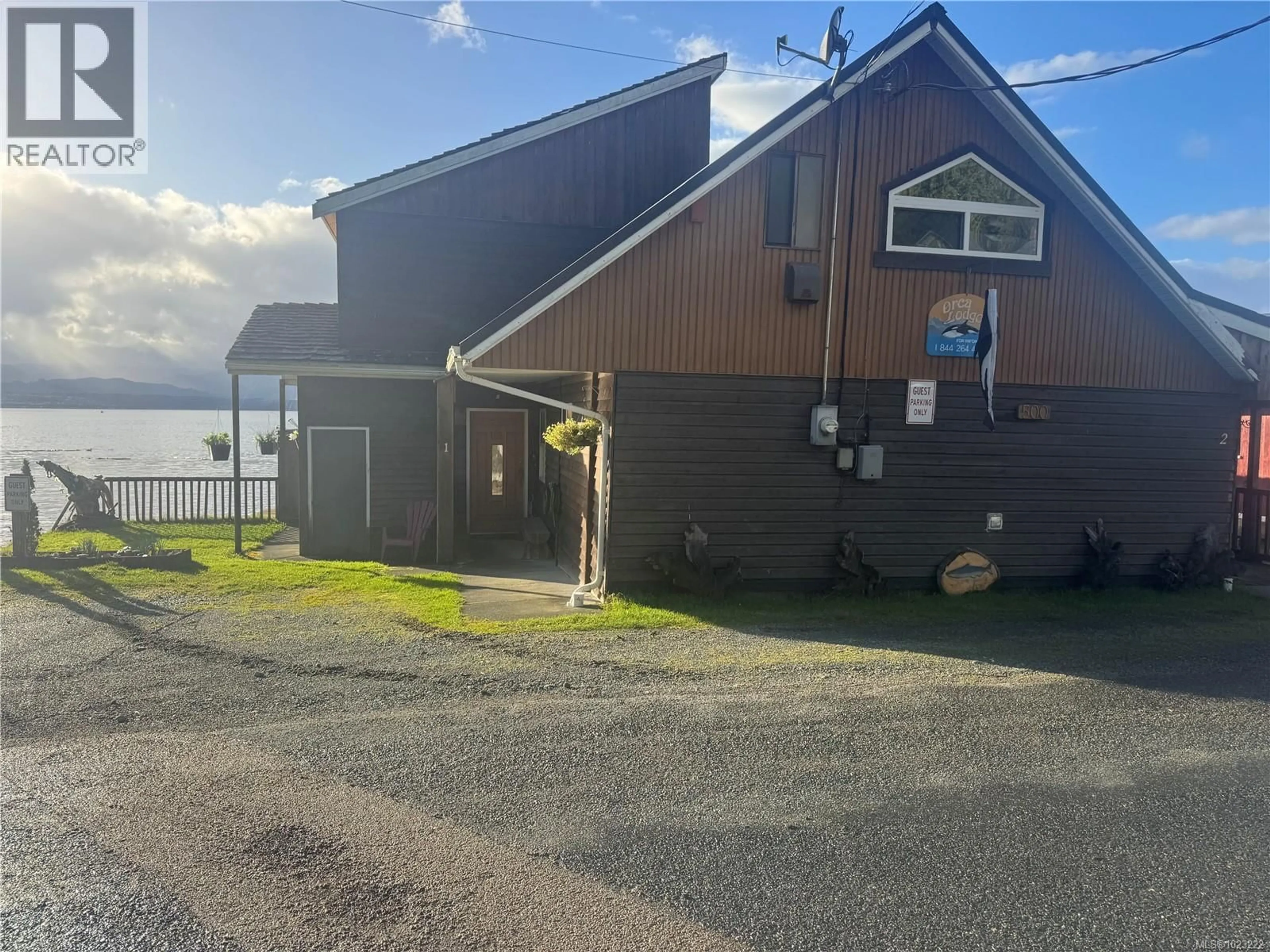 A pic from outside/outdoor area/front of a property/back of a property/a pic from drone, water/lake/river/ocean view for 480&500 1ST STREET, Sointula British Columbia V0N3E0