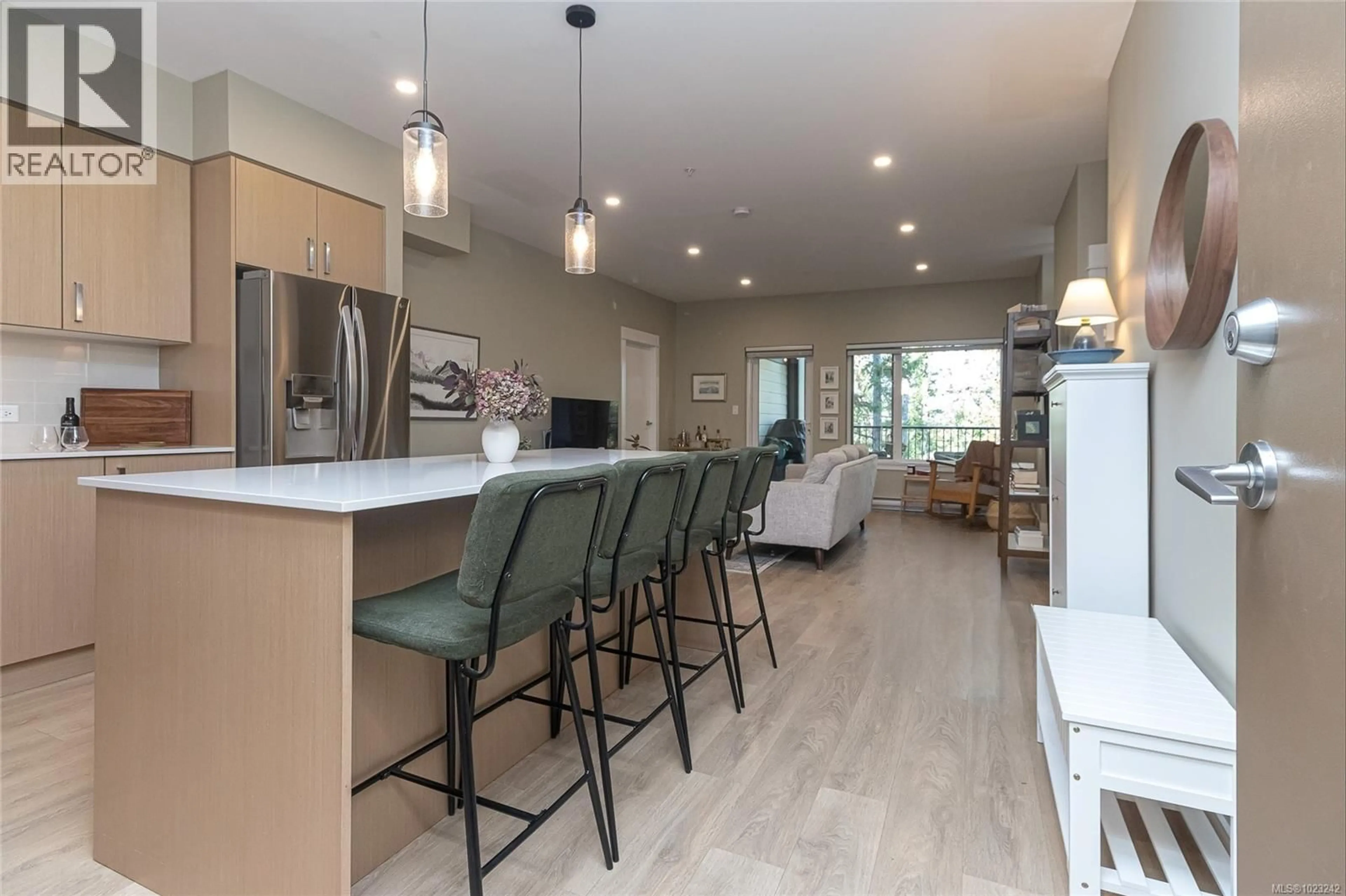 Open concept kitchen, wood/laminate floor for 303 - 290 WILFERT ROAD, View Royal British Columbia V9C0H6
