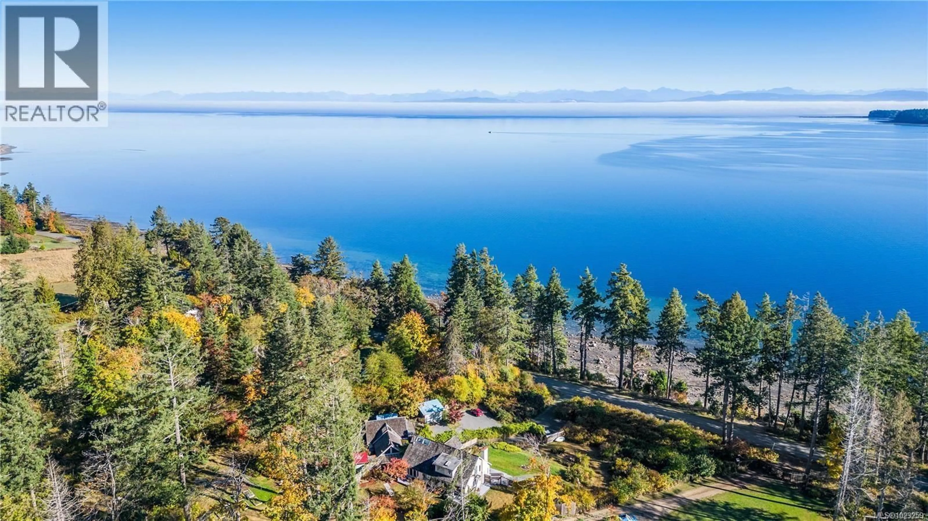 A pic from outside/outdoor area/front of a property/back of a property/a pic from drone, water/lake/river/ocean view for 1901 EAST ROAD, Denman Island British Columbia V0R1T0