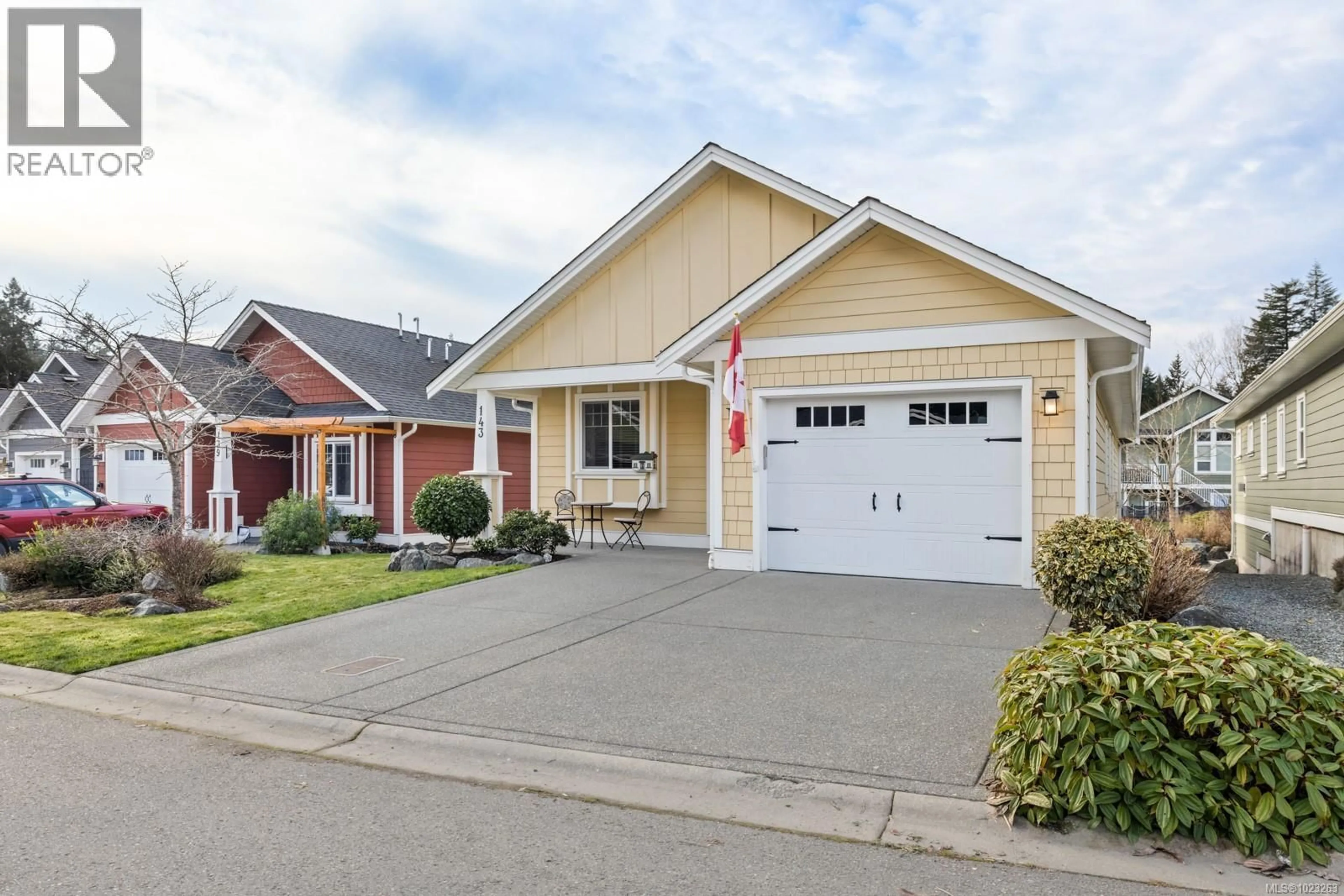 Home with vinyl exterior material, street for 143 VILLAGE WAY, Duncan British Columbia V9L0G6