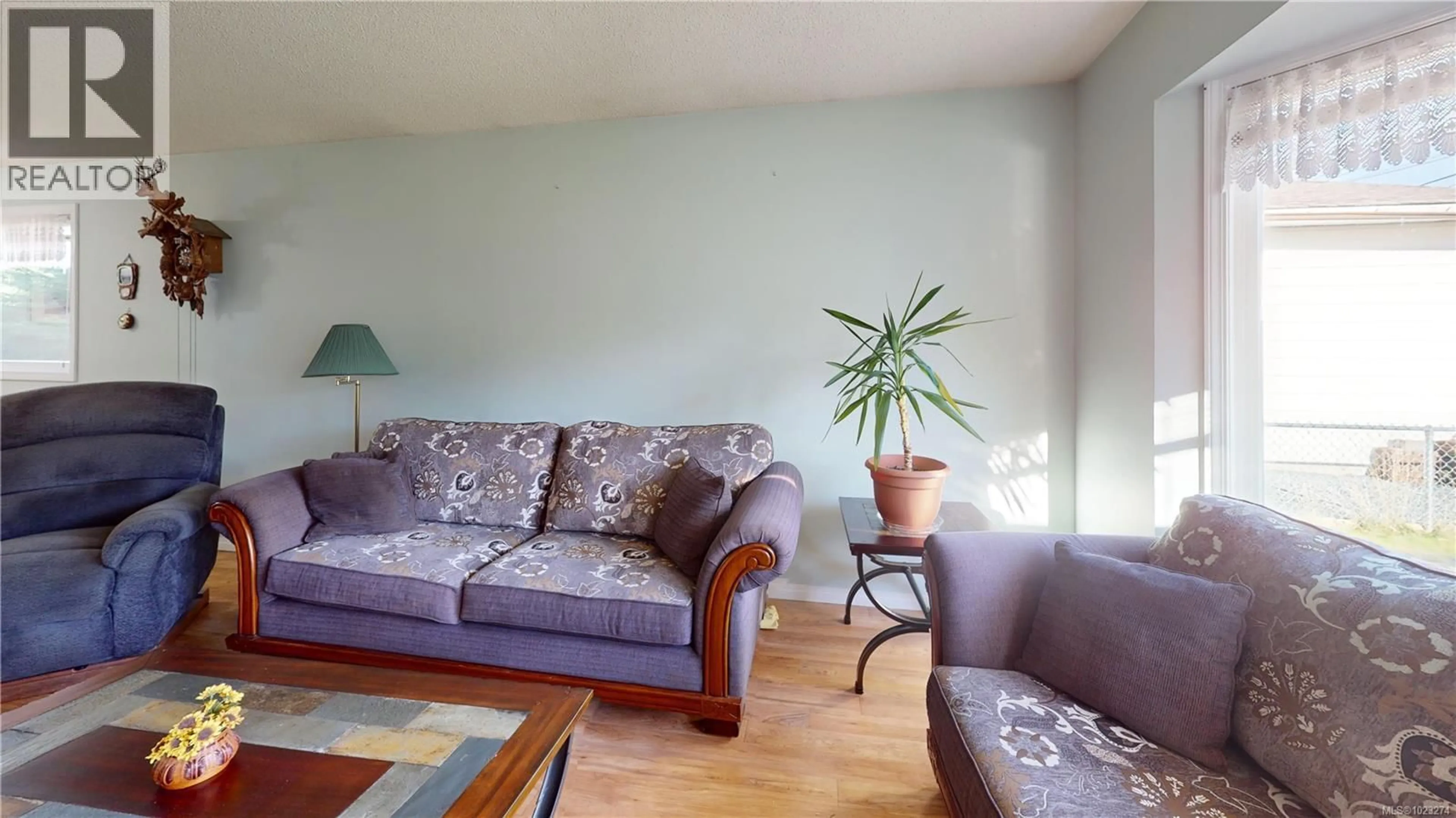 Living room with furniture, wood/laminate floor for 315 PEACOCK STREET, Parksville British Columbia V9P1M5