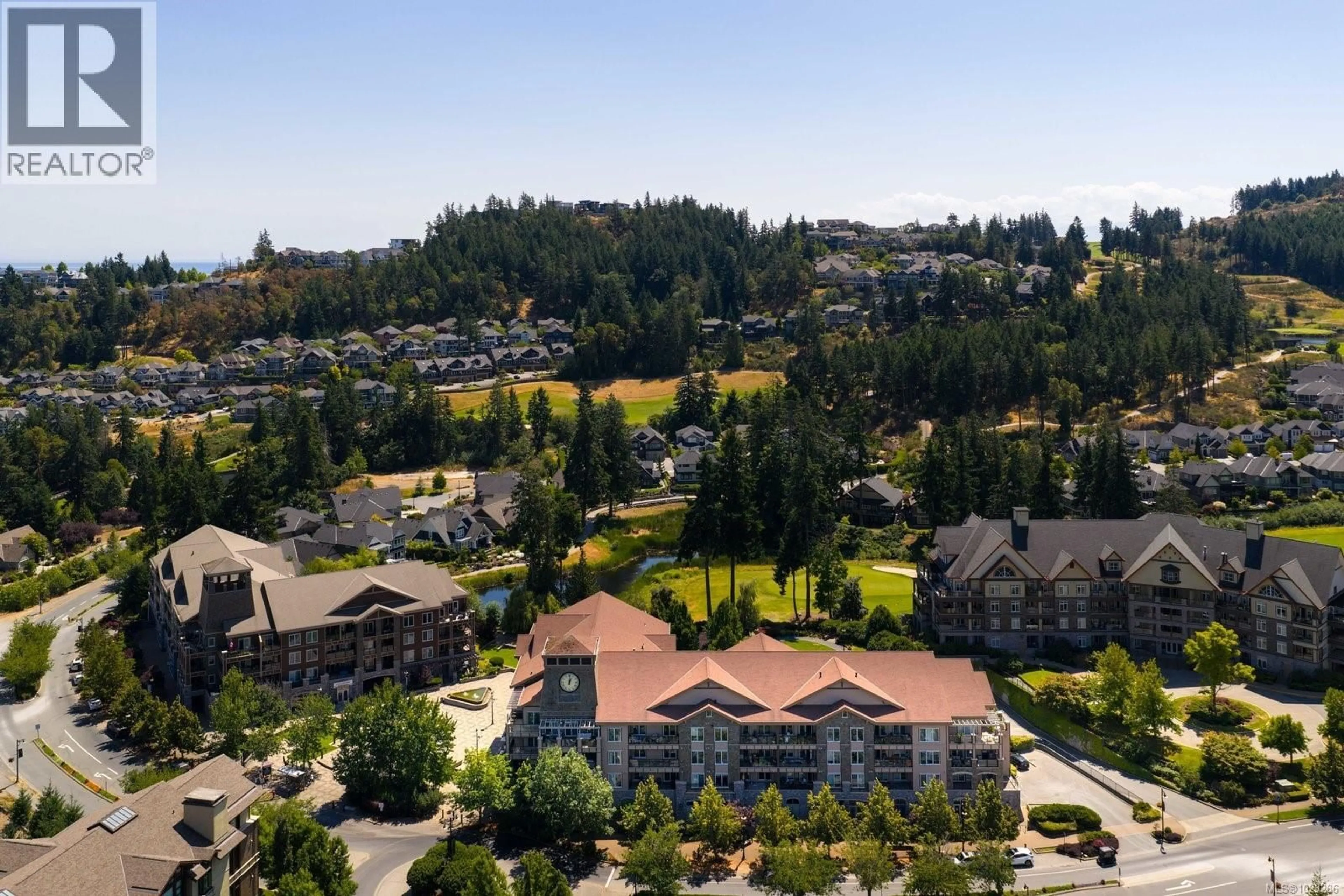 A pic from outside/outdoor area/front of a property/back of a property/a pic from drone, mountain view for 403 - 1335 BEAR MOUNTAIN PARKWAY, Langford British Columbia V9B6T9