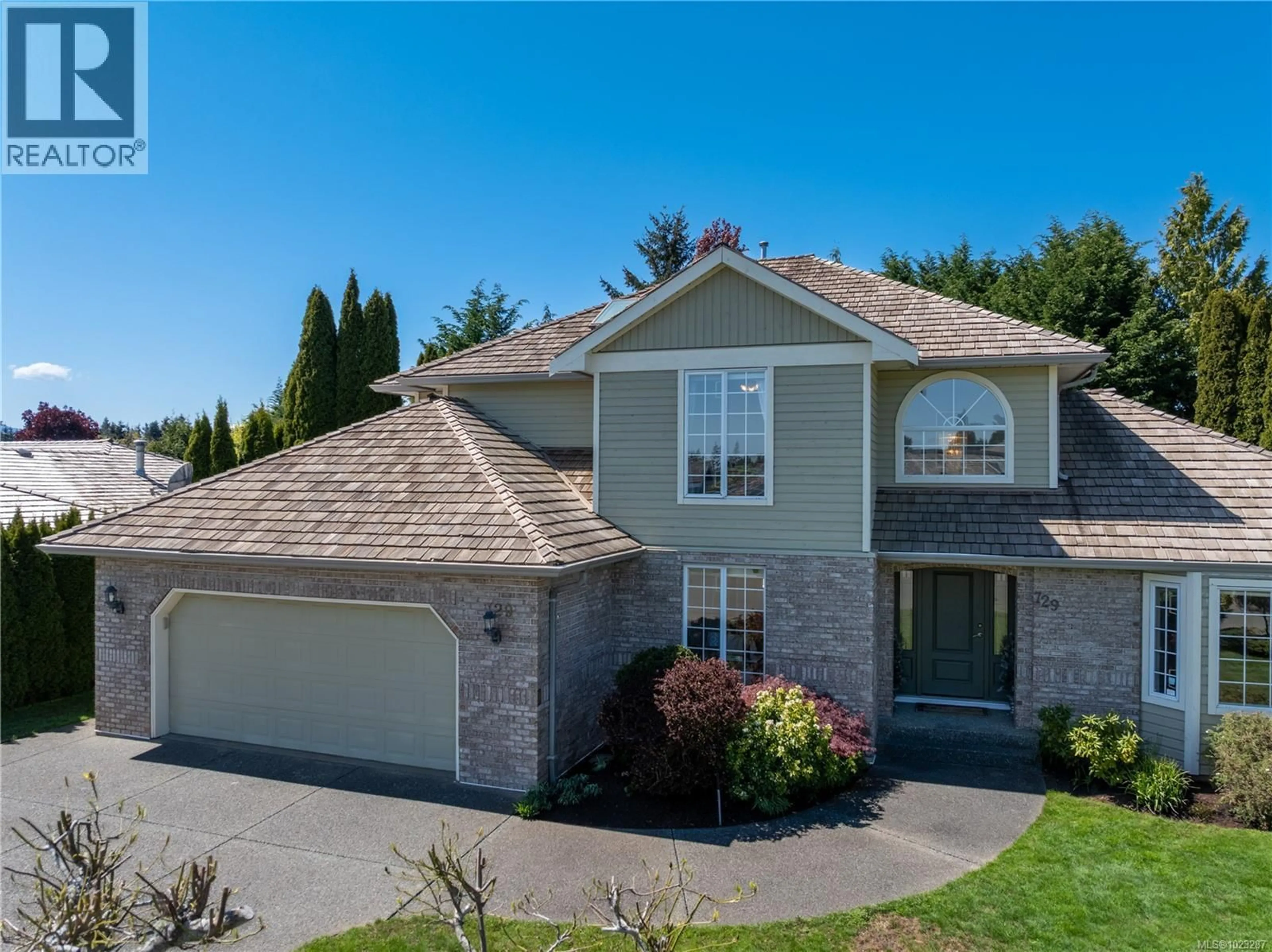 Home with brick exterior material, street for 729 CROWN ISLE DRIVE, Courtenay British Columbia V9N8R5