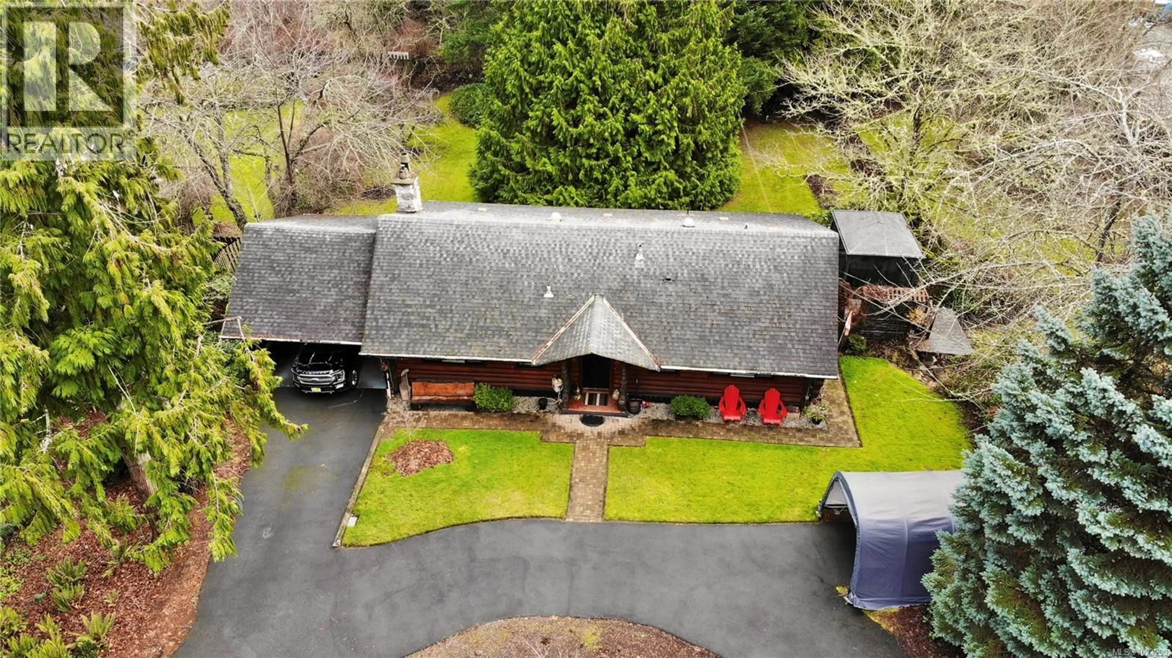 A pic from outside/outdoor area/front of a property/back of a property/a pic from drone, street for 2241 BENKO ROAD, Mill Bay British Columbia V8H1B6