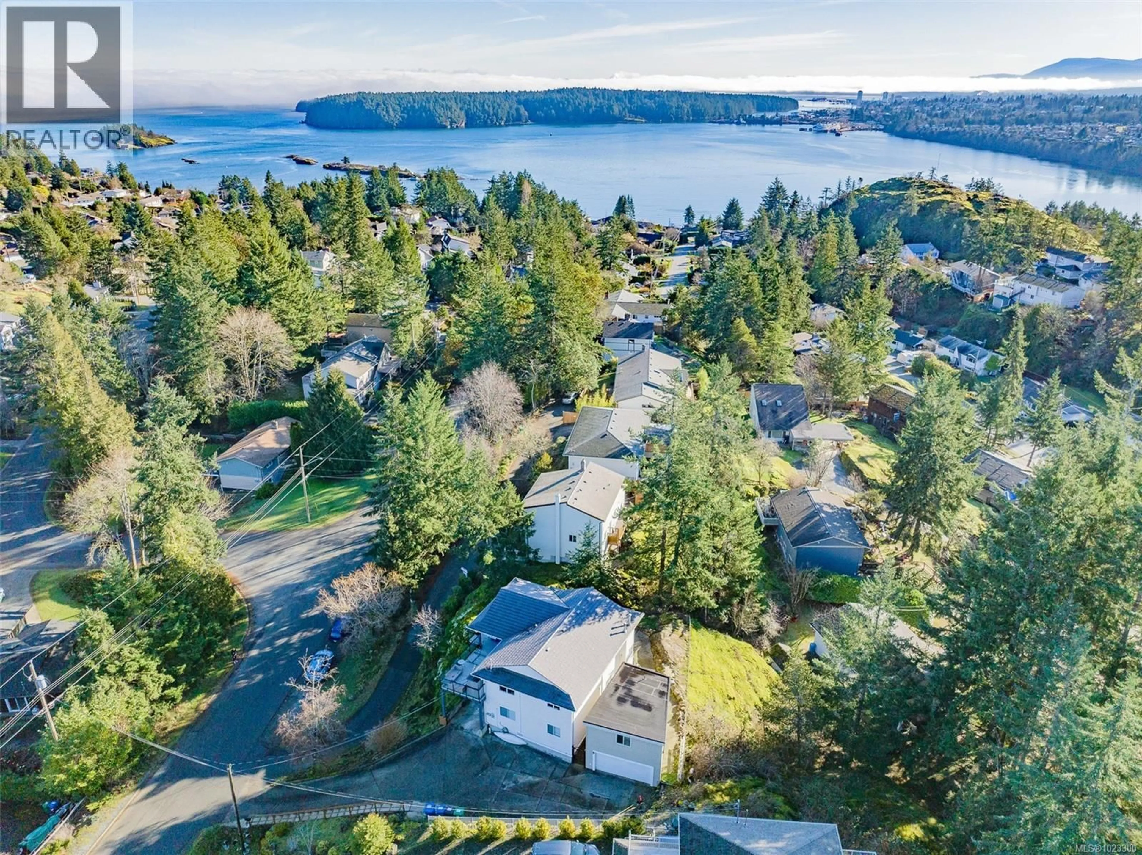 A pic from outside/outdoor area/front of a property/back of a property/a pic from drone, water/lake/river/ocean view for 3134 ROBIN HOOD DRIVE, Nanaimo British Columbia V9J1P1