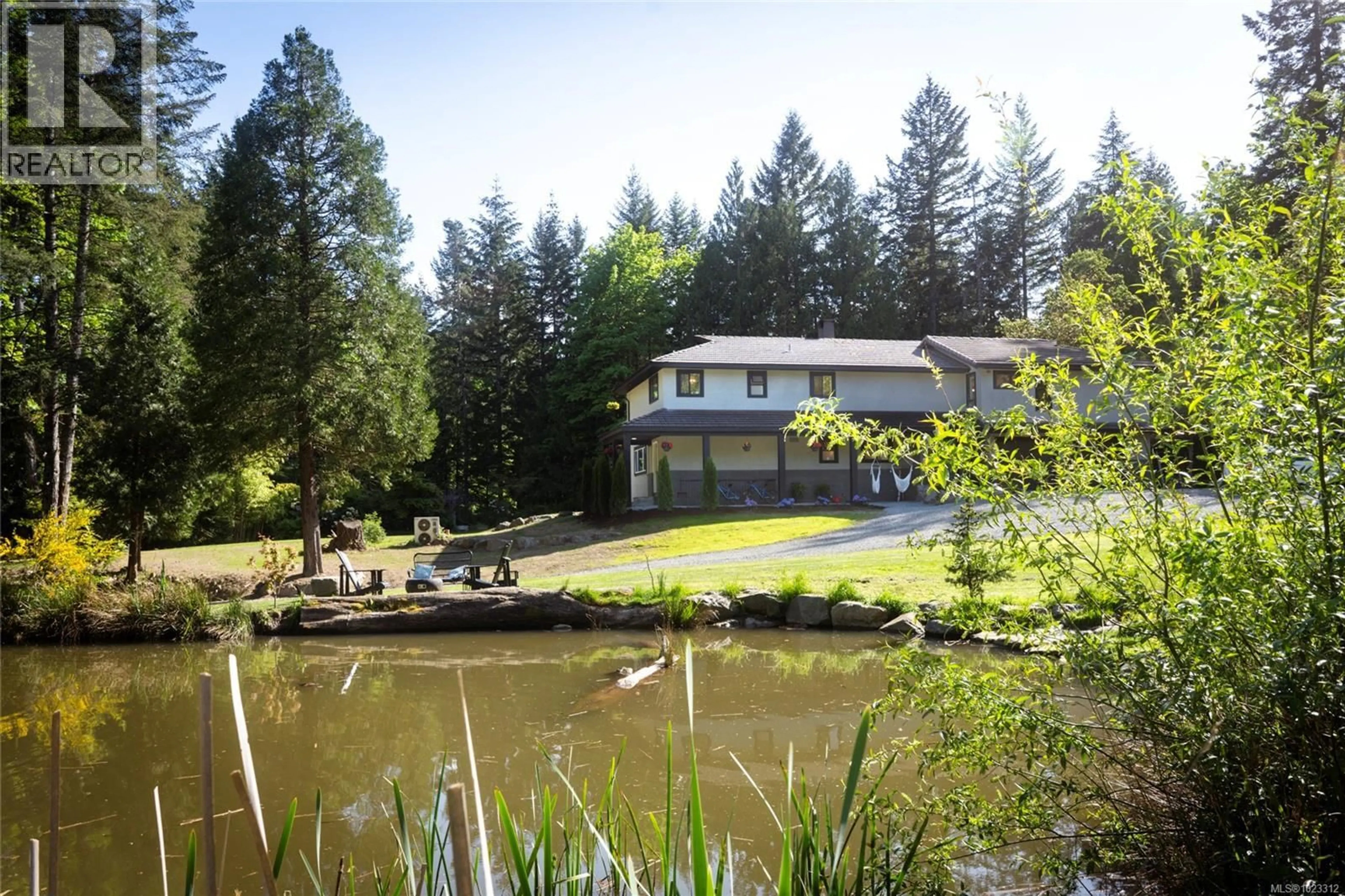 A pic from outside/outdoor area/front of a property/back of a property/a pic from drone, water/lake/river/ocean view for 6866 DOUMONT ROAD, Nanaimo British Columbia V9T6G9