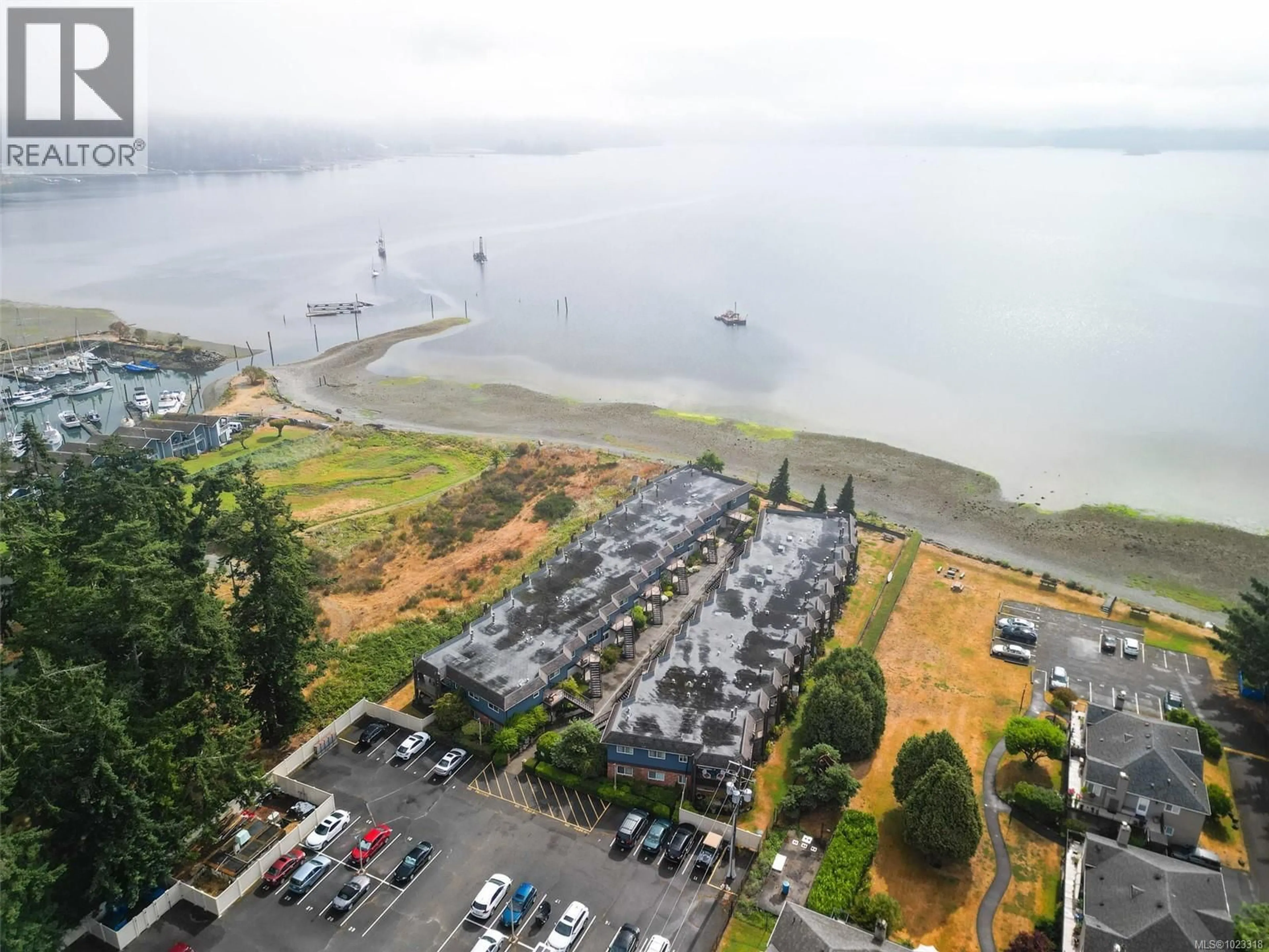 A pic from outside/outdoor area/front of a property/back of a property/a pic from drone, water/lake/river/ocean view for 213 - 1991 KALTASIN ROAD, Sooke British Columbia V9Z0B5