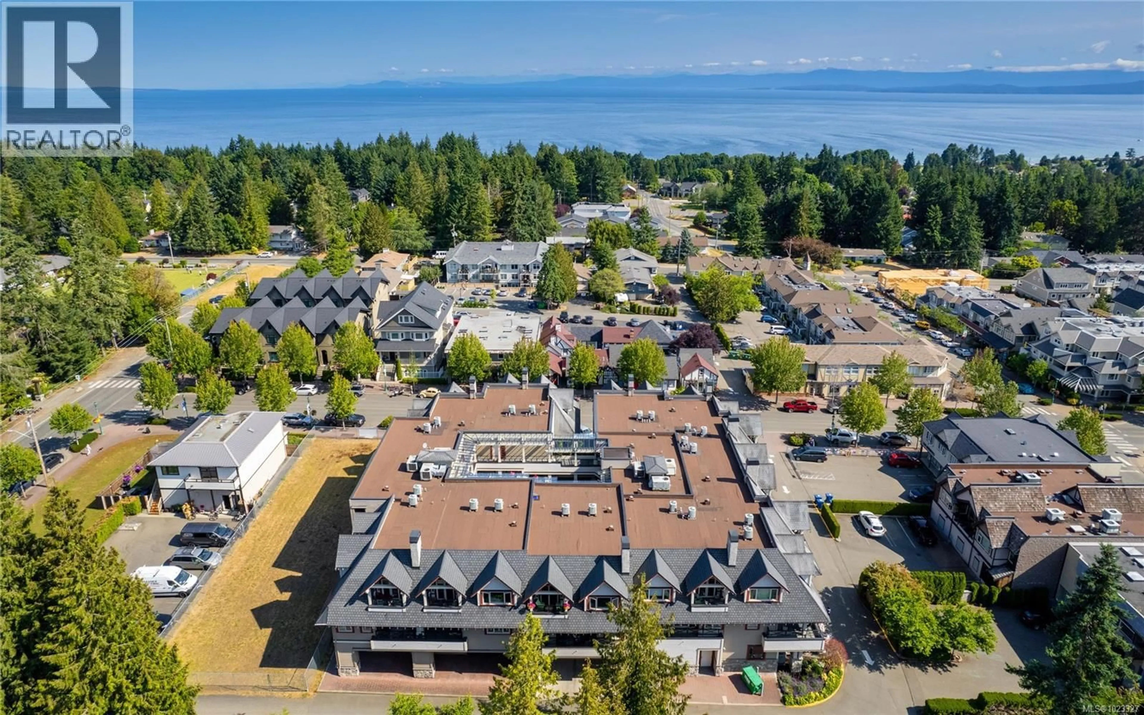 A pic from outside/outdoor area/front of a property/back of a property/a pic from drone, mountain view for 303 - 222 SECOND AVENUE WEST, Qualicum Beach British Columbia V9K0A4