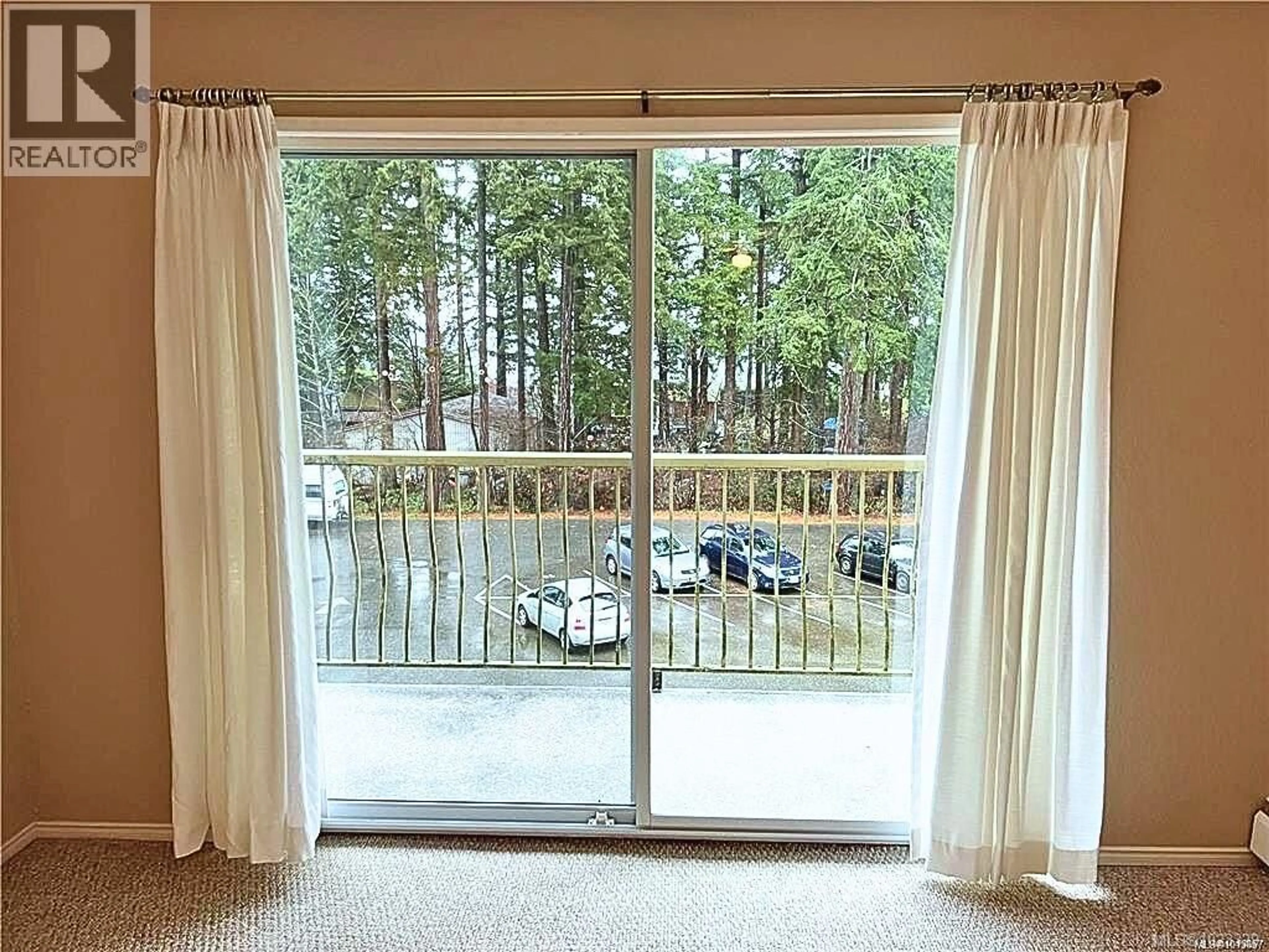 Balcony in the apartment, forest/trees view for 303 - 322 BIRCH STREET, Campbell River British Columbia V9W2S6