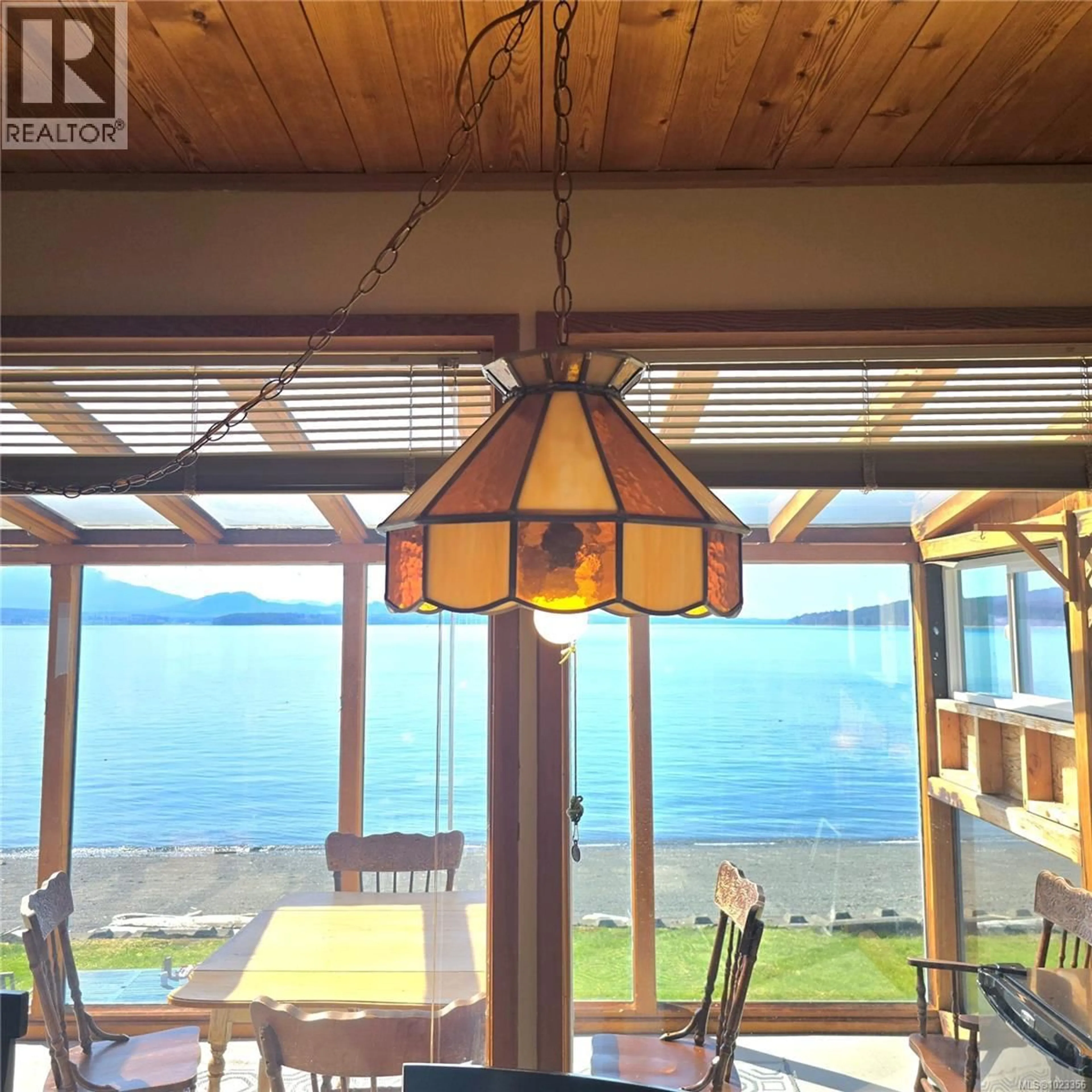 Dining room, wood/laminate floor for 220 1ST STREET, Sointula British Columbia V0N3E0