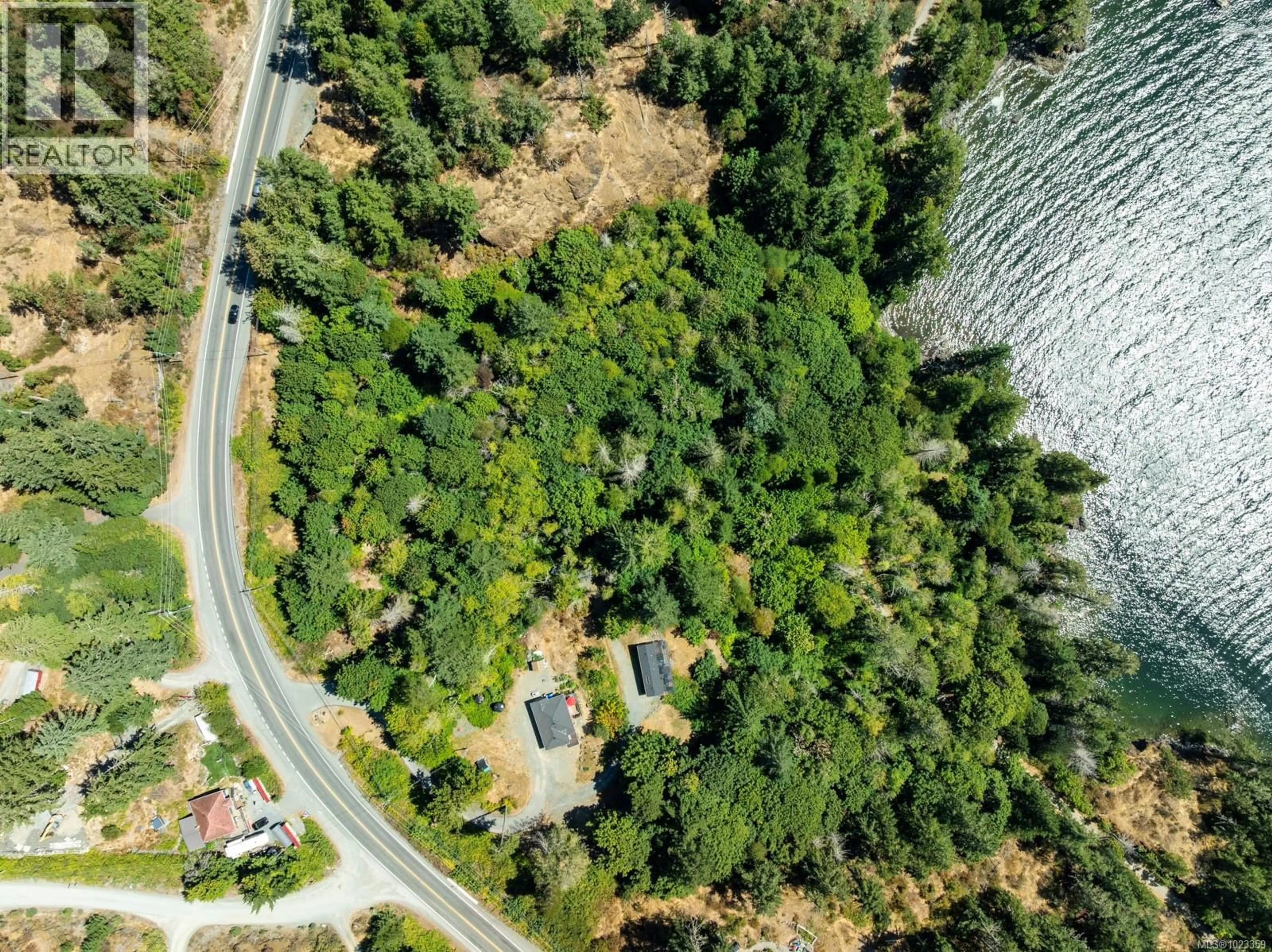 A pic from outside/outdoor area/front of a property/back of a property/a pic from drone, forest/trees view for 5211 SOOKE ROAD, Sooke British Columbia V8V1L9