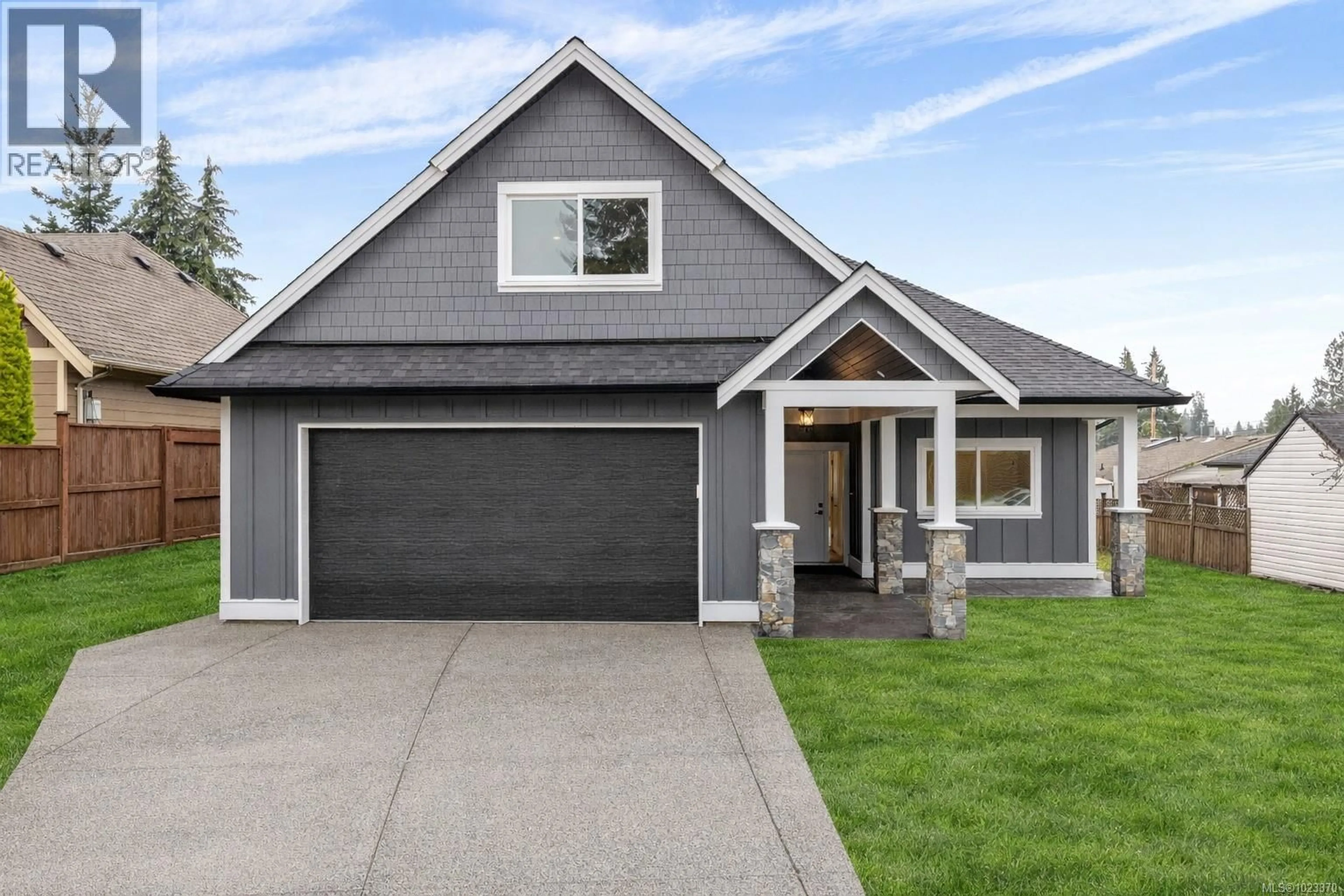 Home with vinyl exterior material, street for 715 DOEHLE AVENUE, Parksville British Columbia V9P2V1