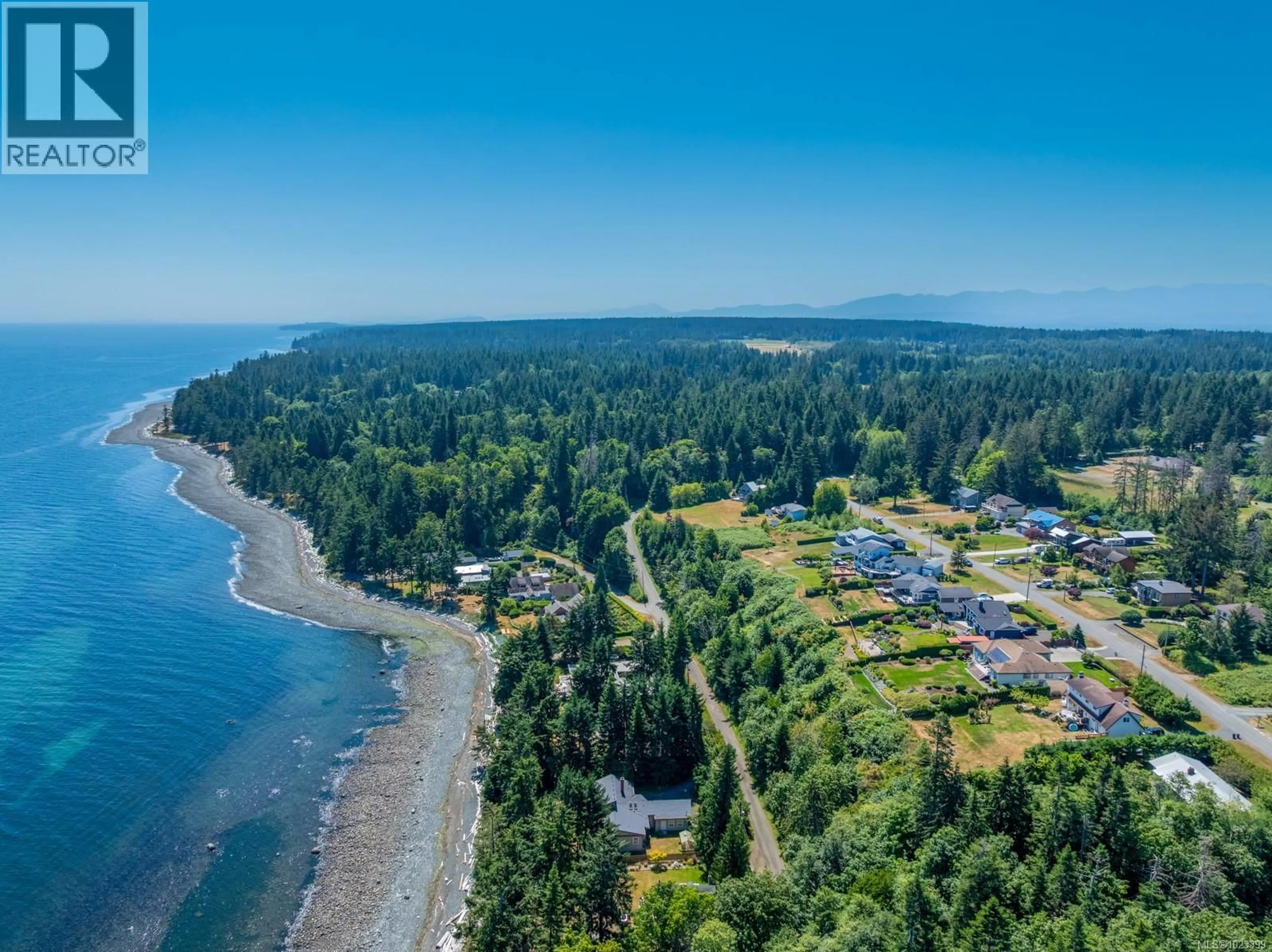 A pic from outside/outdoor area/front of a property/back of a property/a pic from drone, water/lake/river/ocean view for 6348 EAGLES DRIVE, Courtenay British Columbia V9J1V4