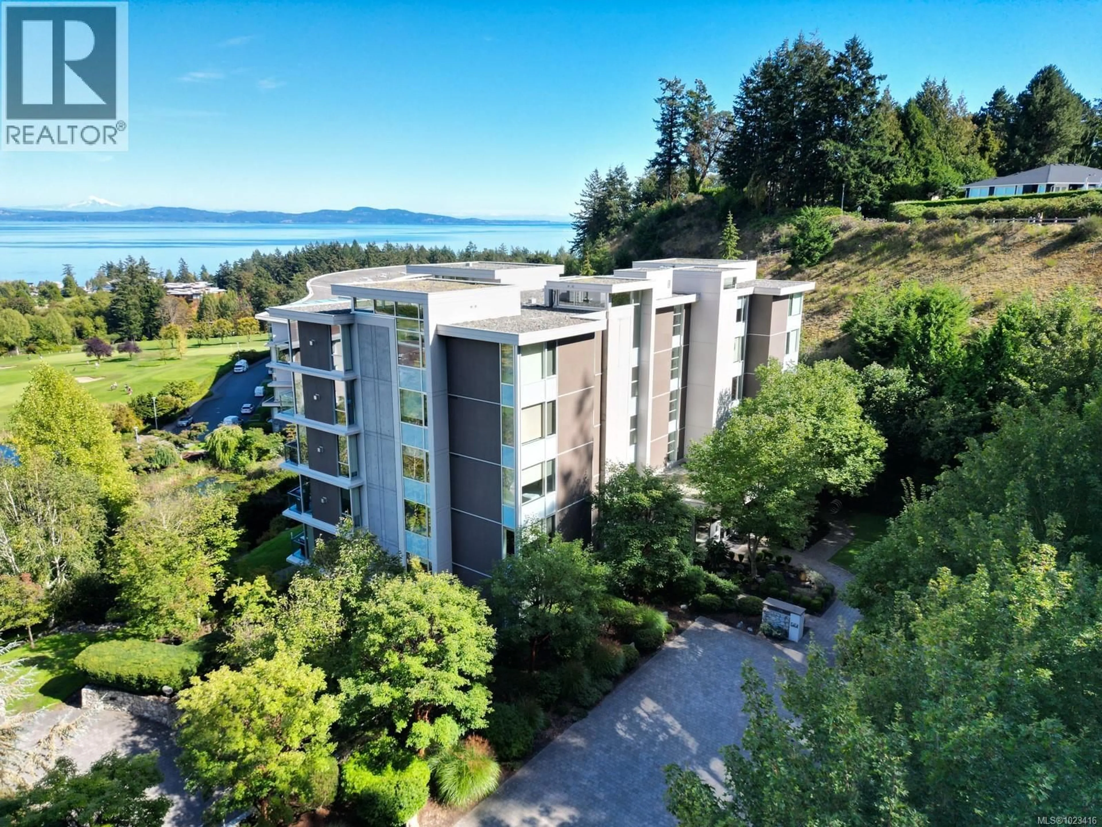 A pic from outside/outdoor area/front of a property/back of a property/a pic from drone, water/lake/river/ocean view for 302 - 738 SAYWARD HILL TERRACE, Saanich British Columbia V8Y3K1