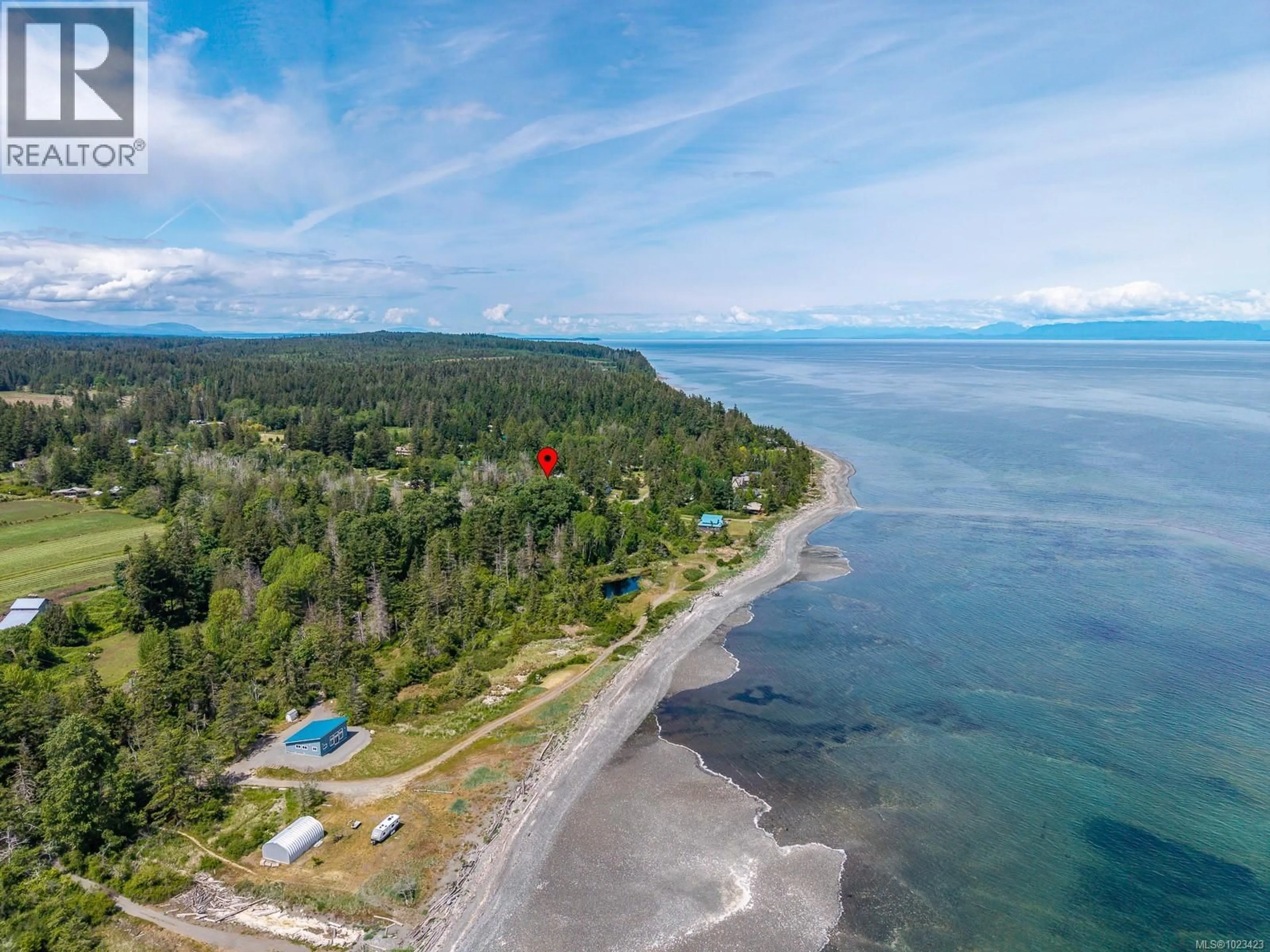 A pic from outside/outdoor area/front of a property/back of a property/a pic from drone, water/lake/river/ocean view for 1415 BAIKIE ROAD, Denman Island British Columbia V0R1T0