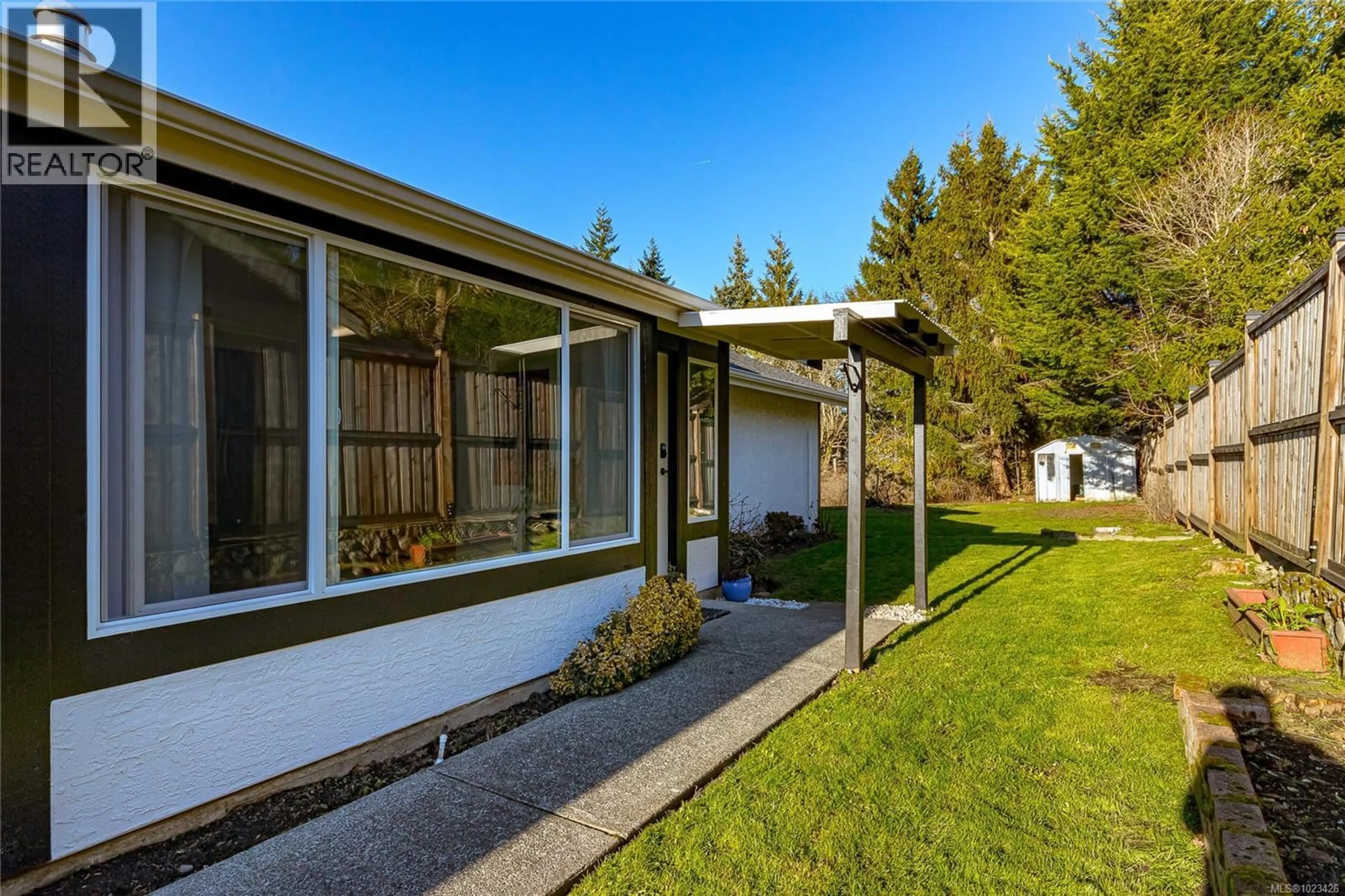Home with vinyl exterior material, street for 710 GREENLEA DRIVE, Saanich British Columbia V8Z6V8