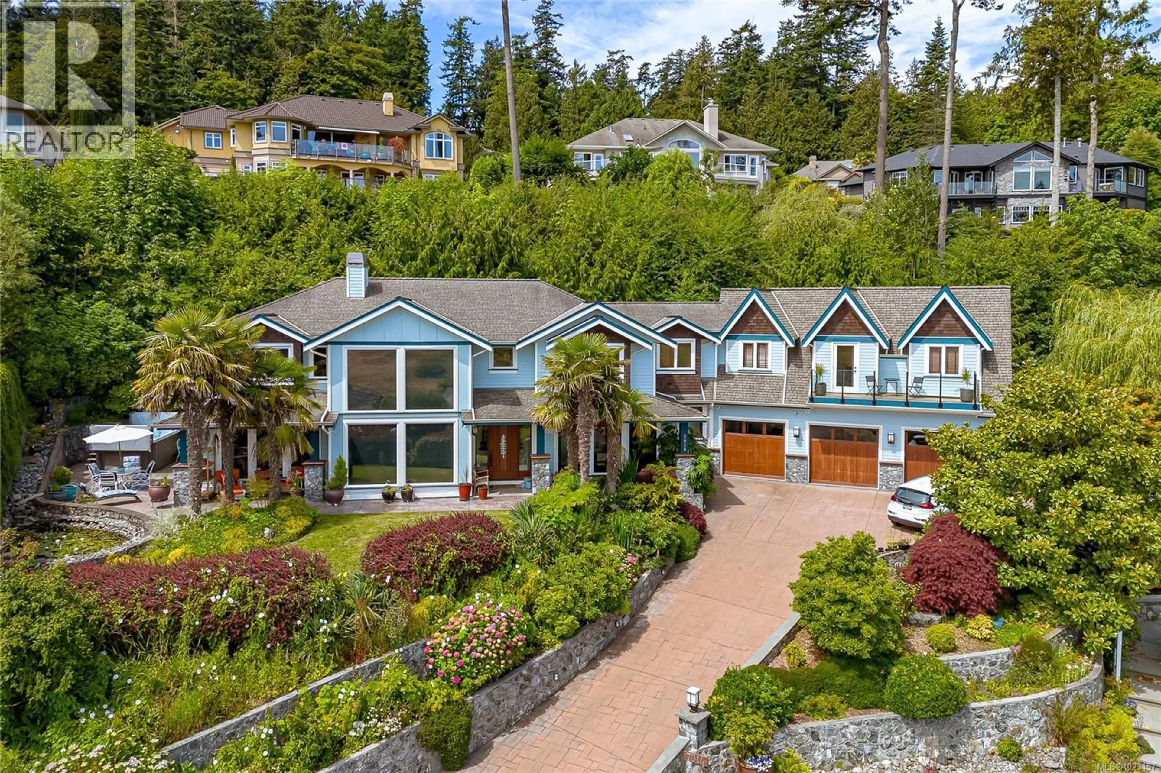 A pic from outside/outdoor area/front of a property/back of a property/a pic from drone, water/lake/river/ocean view for 7014 BEACH VIEW COURT, Central Saanich British Columbia V8M2J7