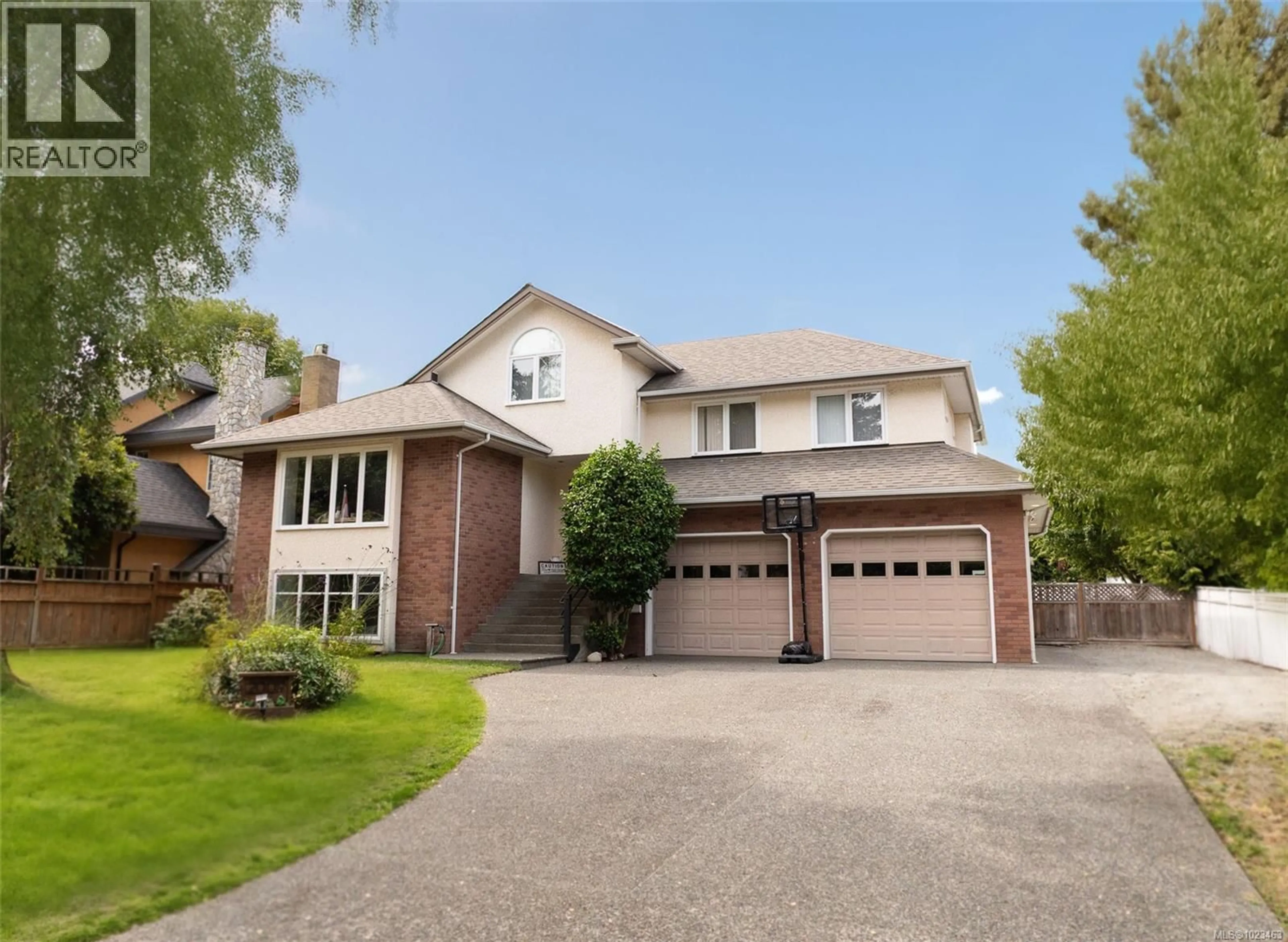 Home with brick exterior material, street for 2009 FERNDALE ROAD, Saanich British Columbia V8N2Y4