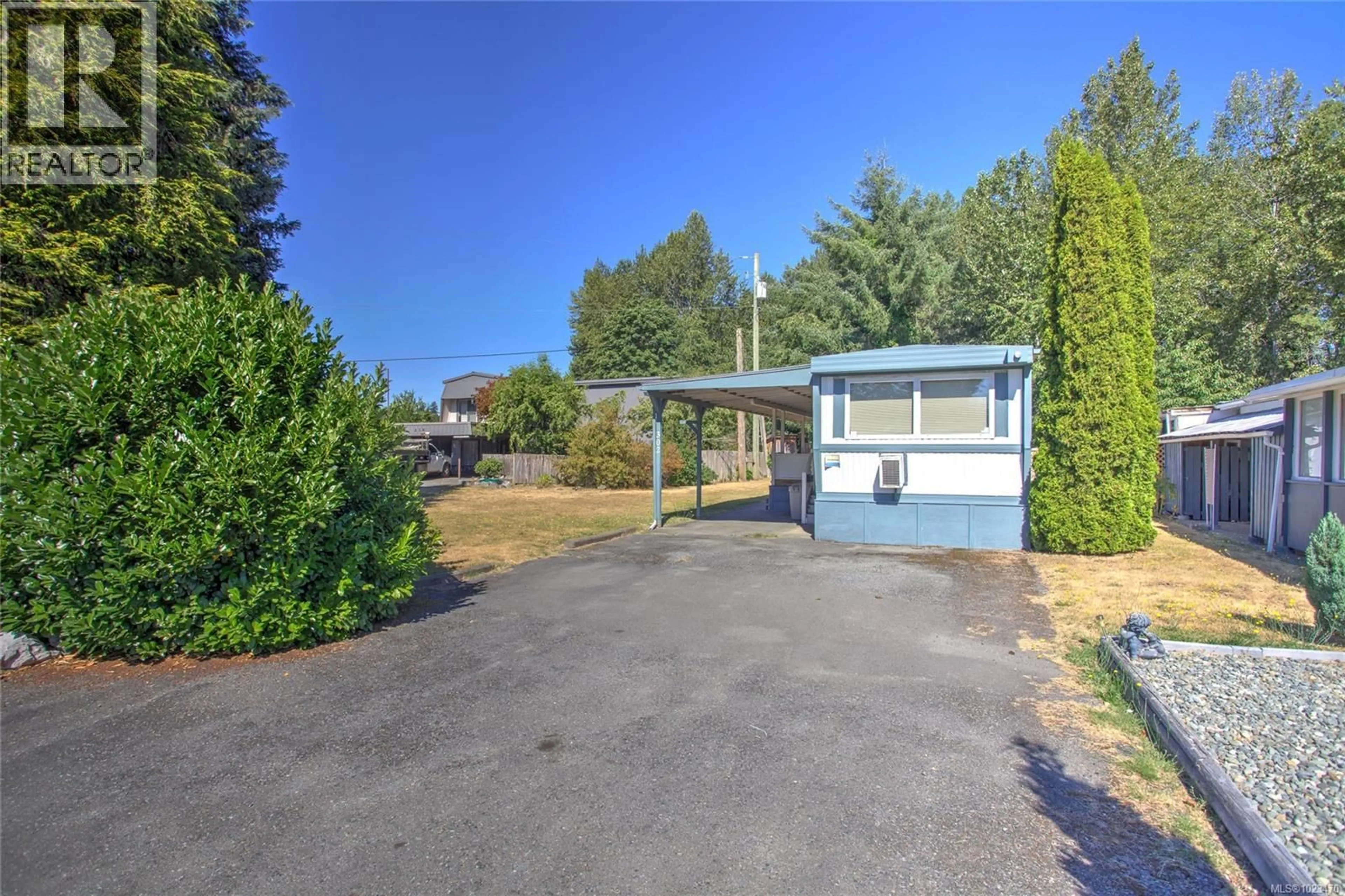 A pic from outside/outdoor area/front of a property/back of a property/a pic from drone, street for 302 - 2885 BOYS ROAD, Duncan British Columbia V9L4Y9
