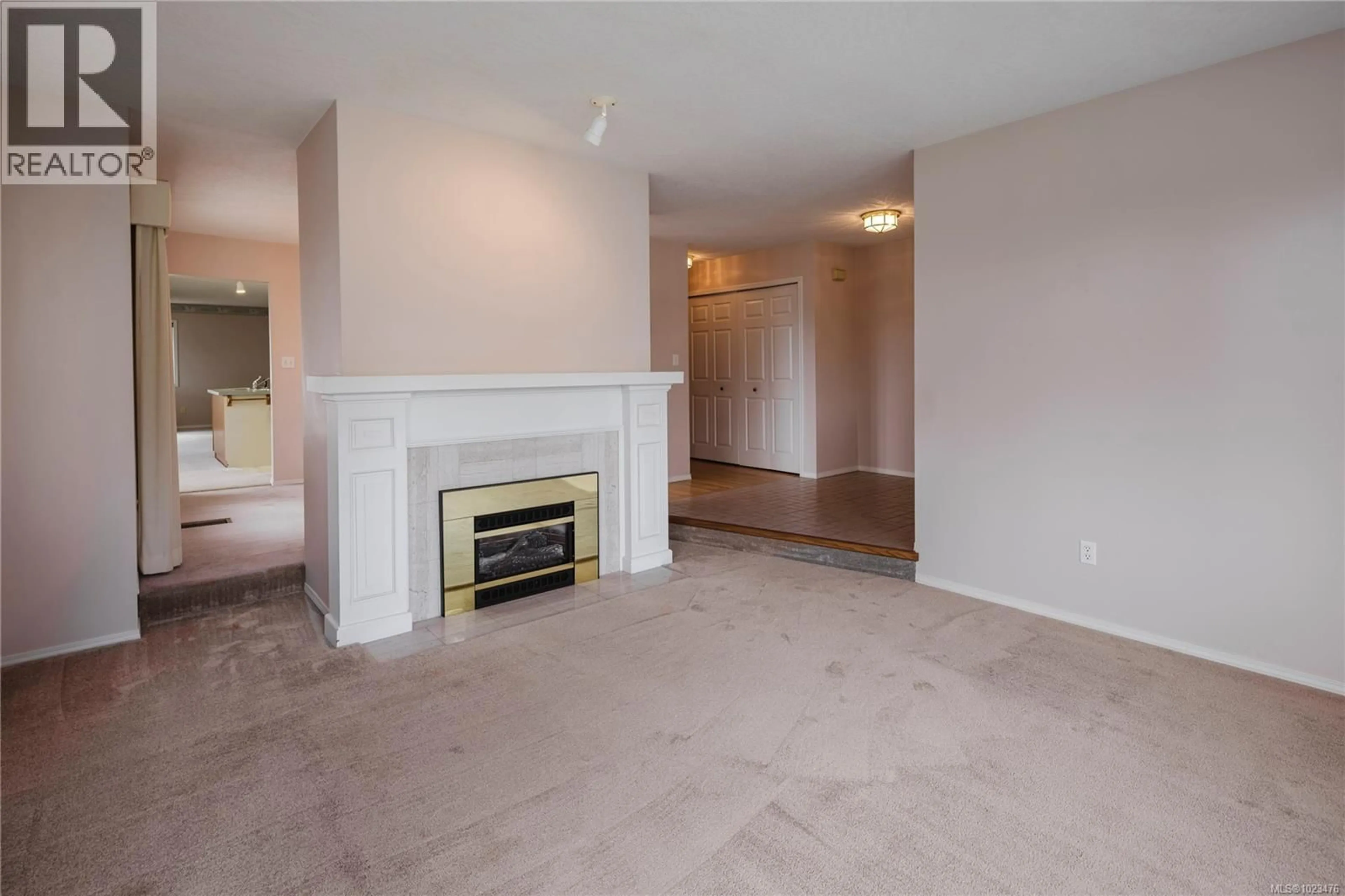 Living room with furniture, unknown for 4867 MAXINE LANE, Saanich British Columbia V8Y2J3