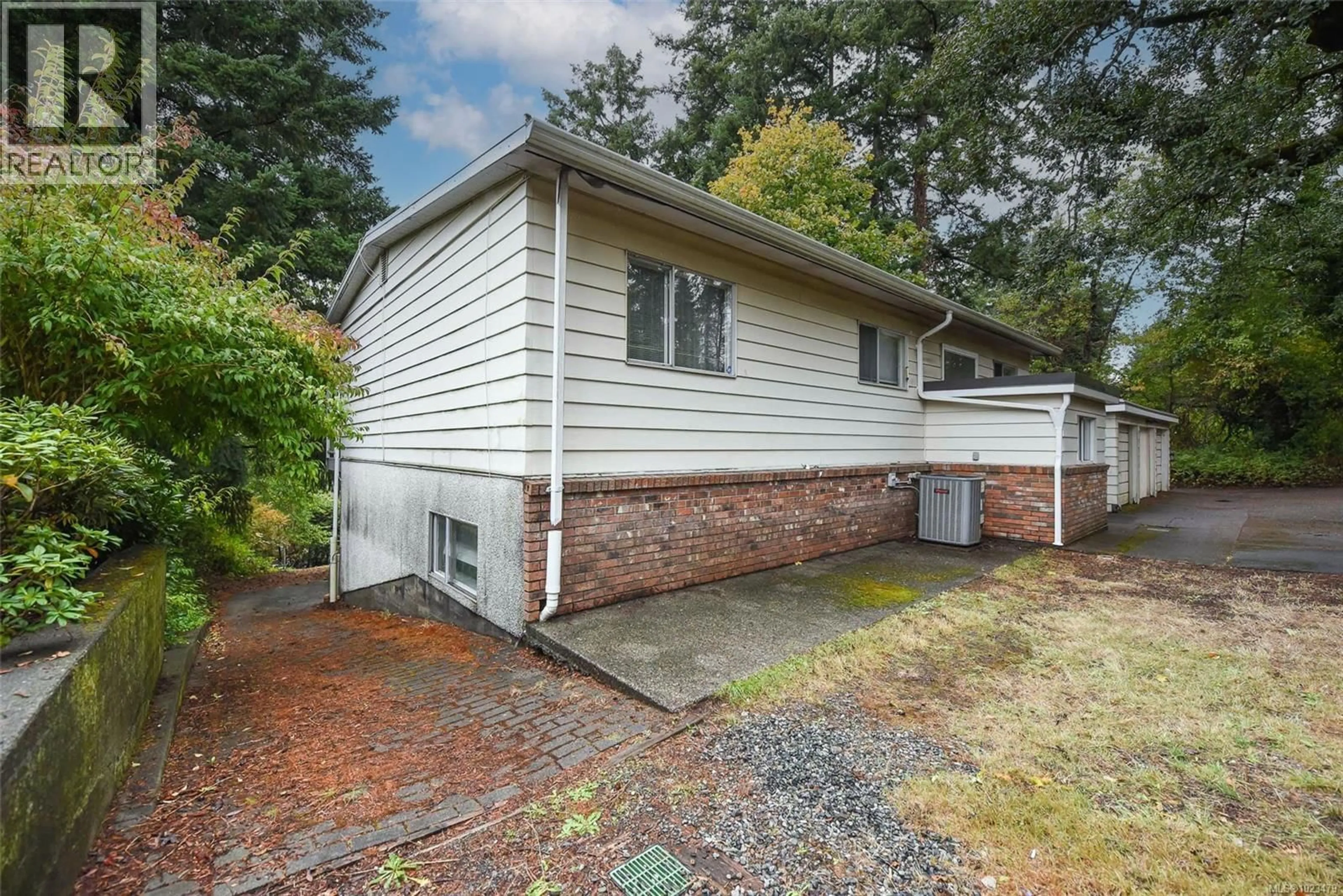 Home with vinyl exterior material, street for 4667 MCQUILLAN ROAD, Courtenay British Columbia V9N3T6