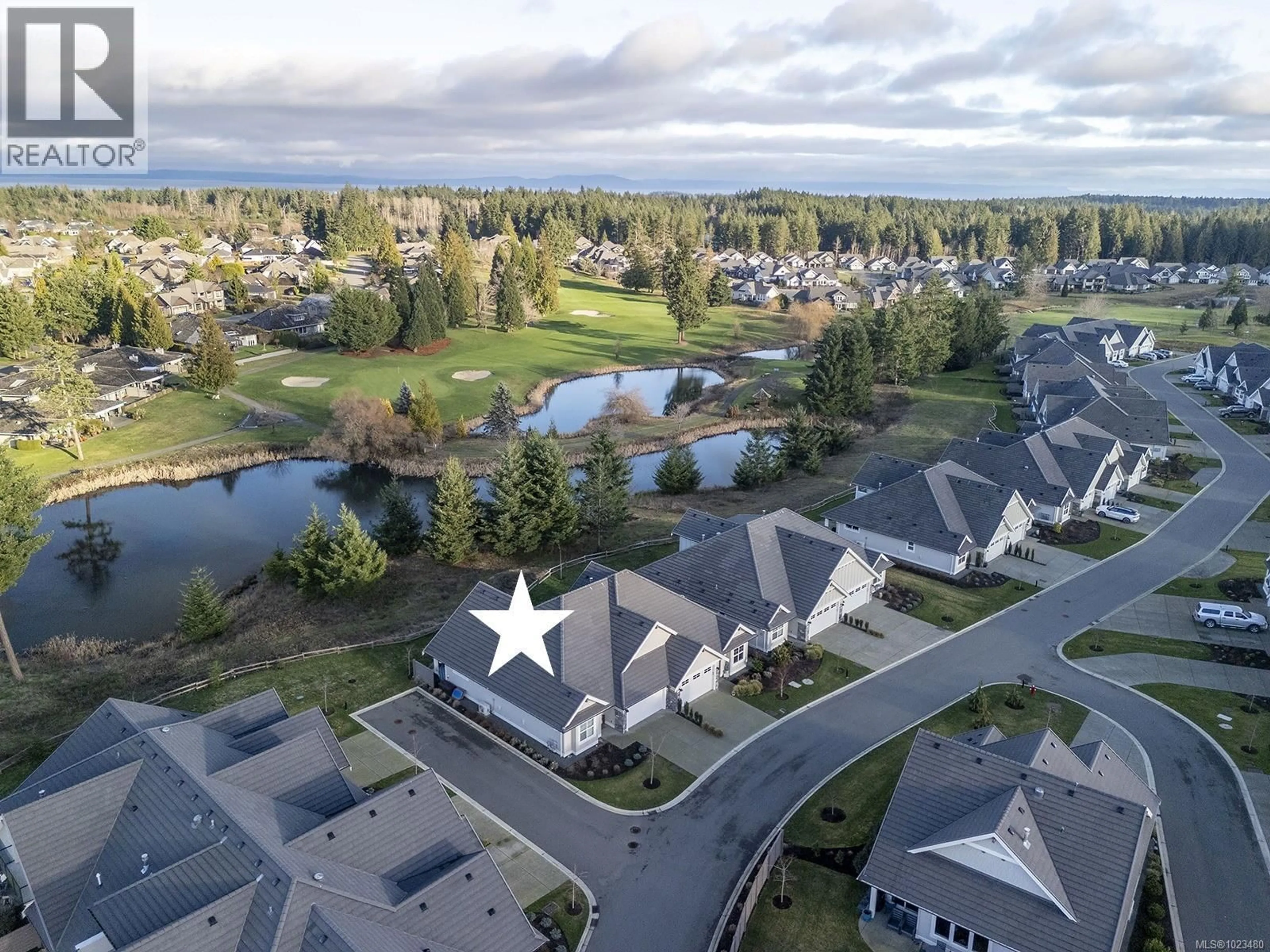 A pic from outside/outdoor area/front of a property/back of a property/a pic from drone, water/lake/river/ocean view for 108 - 1444 CROWN ISLE DRIVE, Courtenay British Columbia V9N0B8