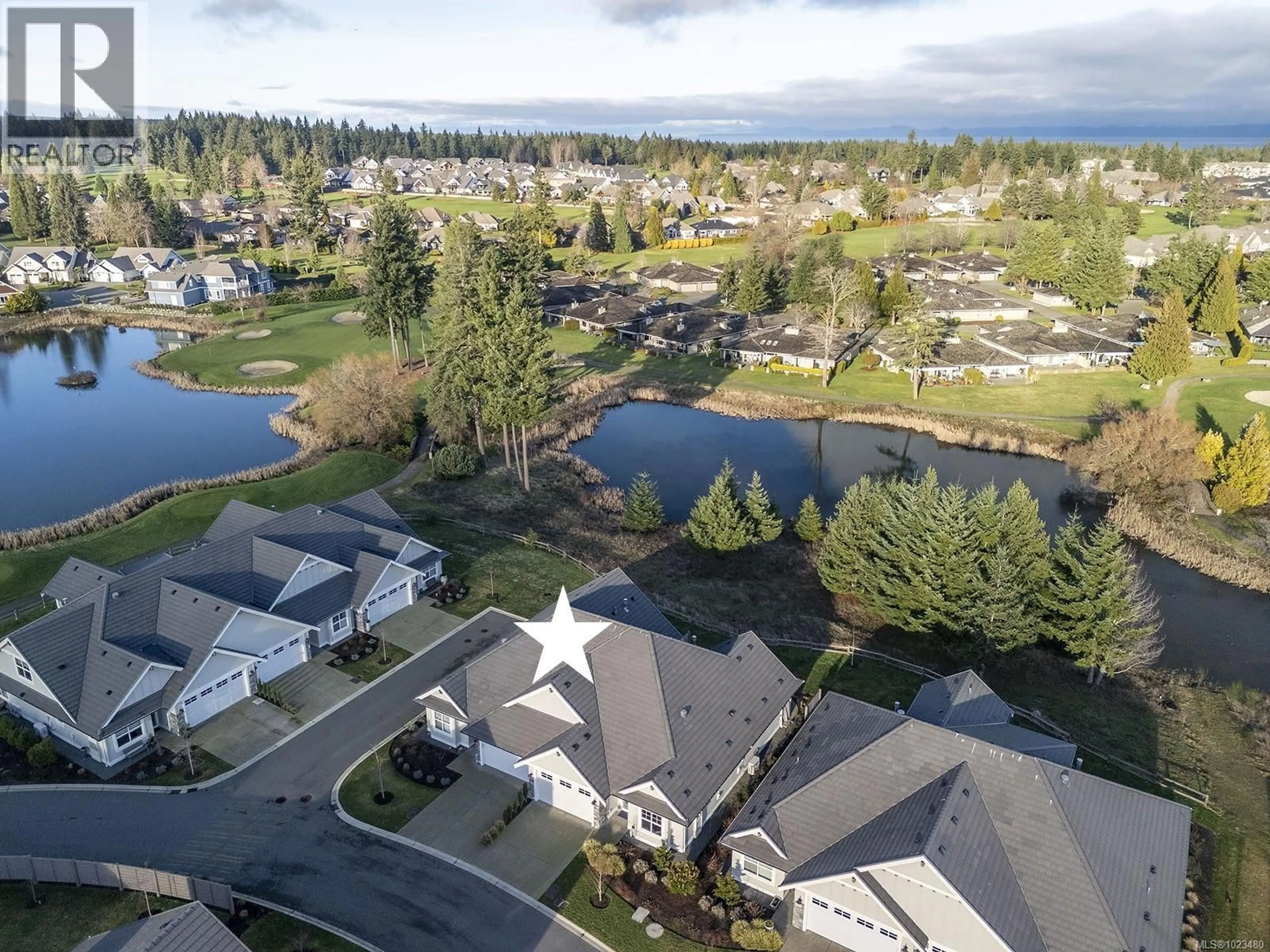 A pic from outside/outdoor area/front of a property/back of a property/a pic from drone, water/lake/river/ocean view for 108 - 1444 CROWN ISLE DRIVE, Courtenay British Columbia V9N0B8