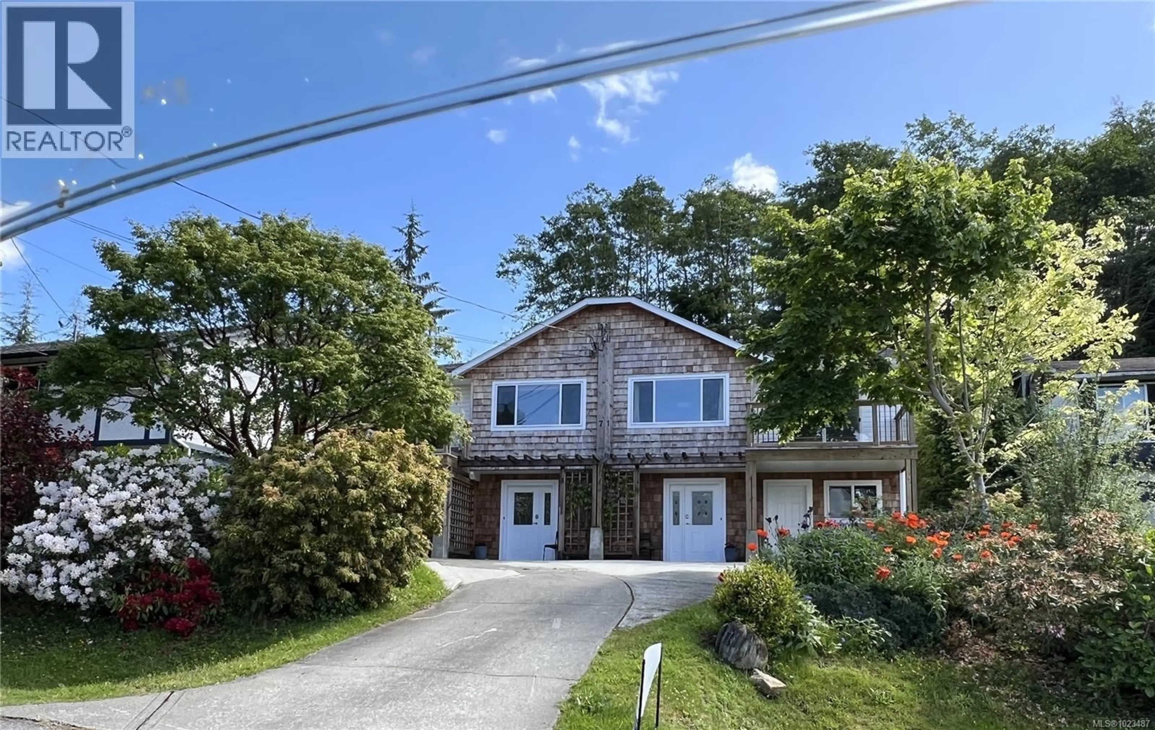 A pic from outside/outdoor area/front of a property/back of a property/a pic from drone, street for A - 71 ORCA WAY, Alert Bay British Columbia V0N1A0