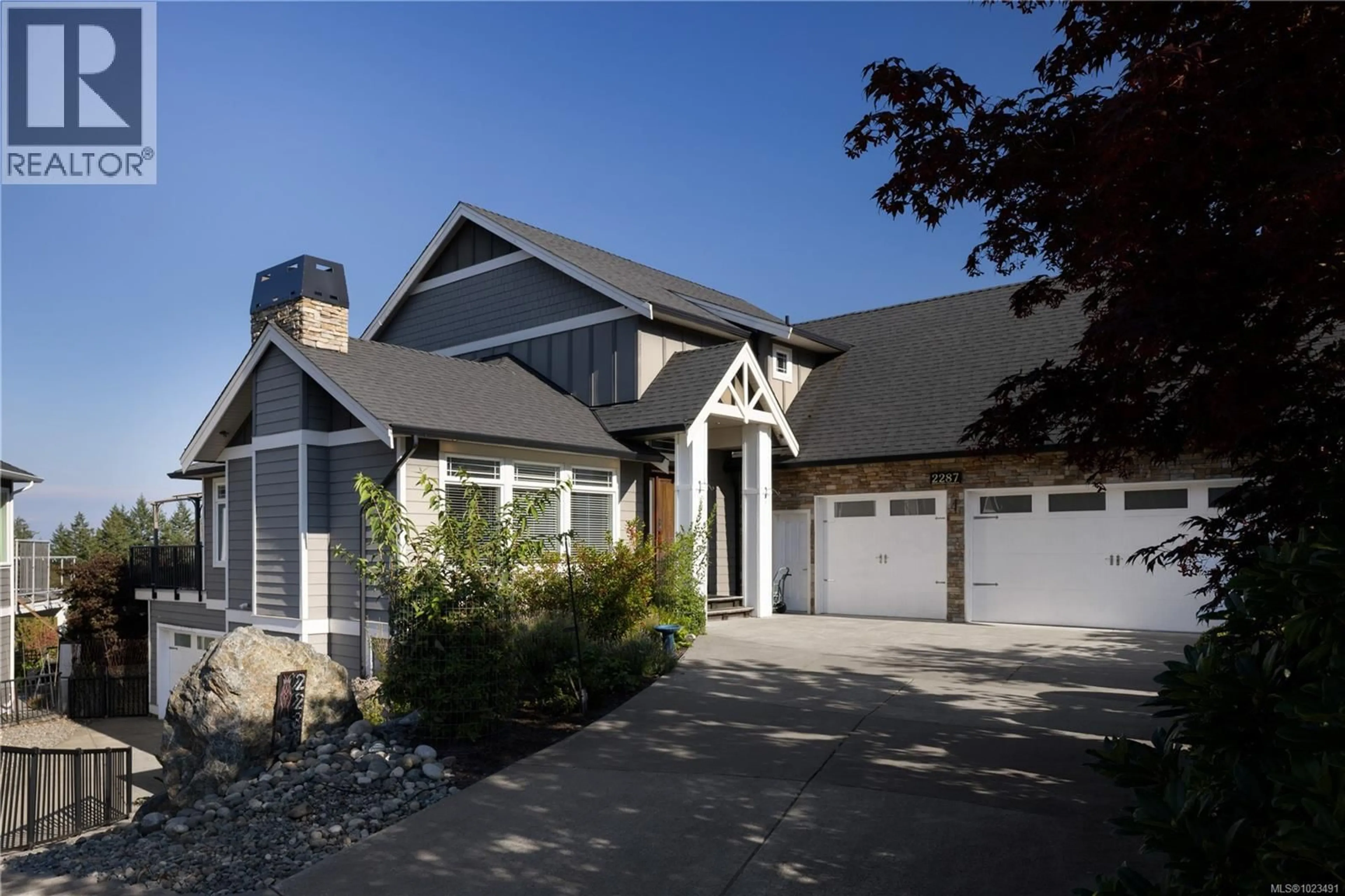 Home with vinyl exterior material, street for 2287 NICKLAUS DRIVE, Langford British Columbia V9B0L2