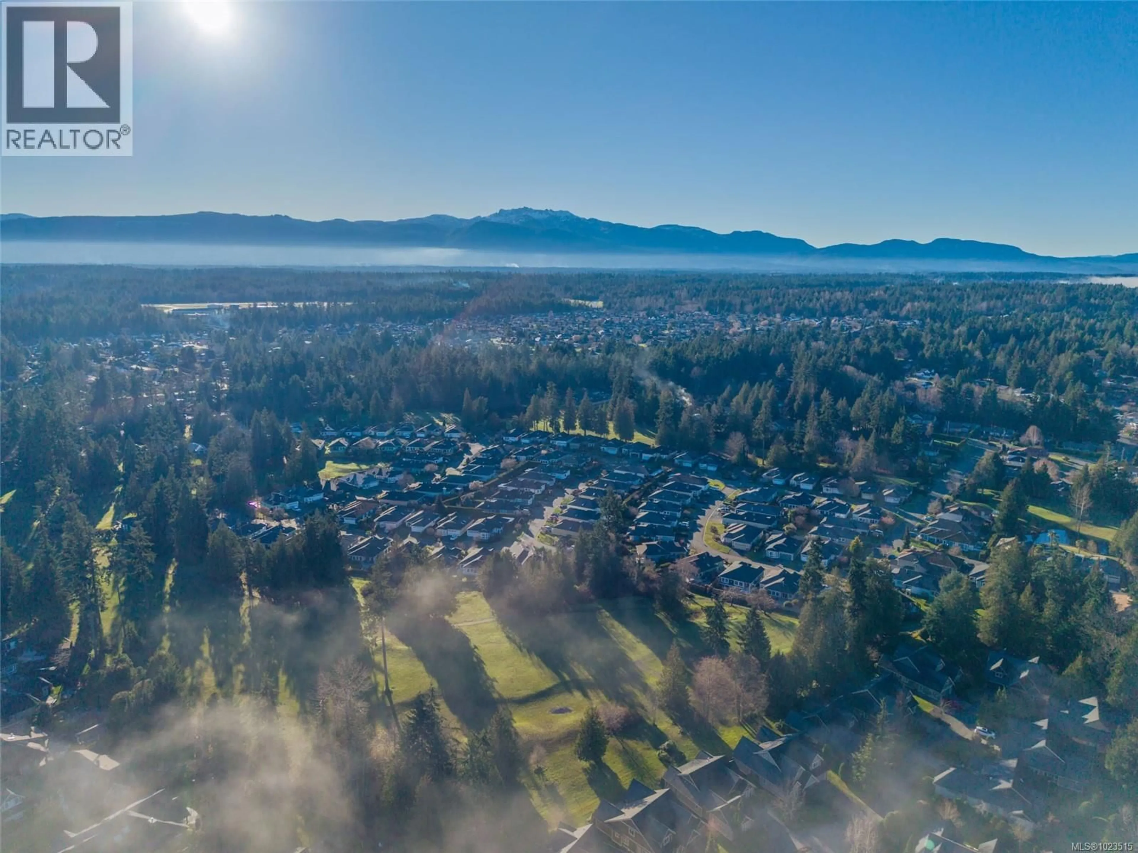 A pic from outside/outdoor area/front of a property/back of a property/a pic from drone, mountain view for 1293 OCEANSIDE DRIVE, Qualicum Beach British Columbia V9K2K4