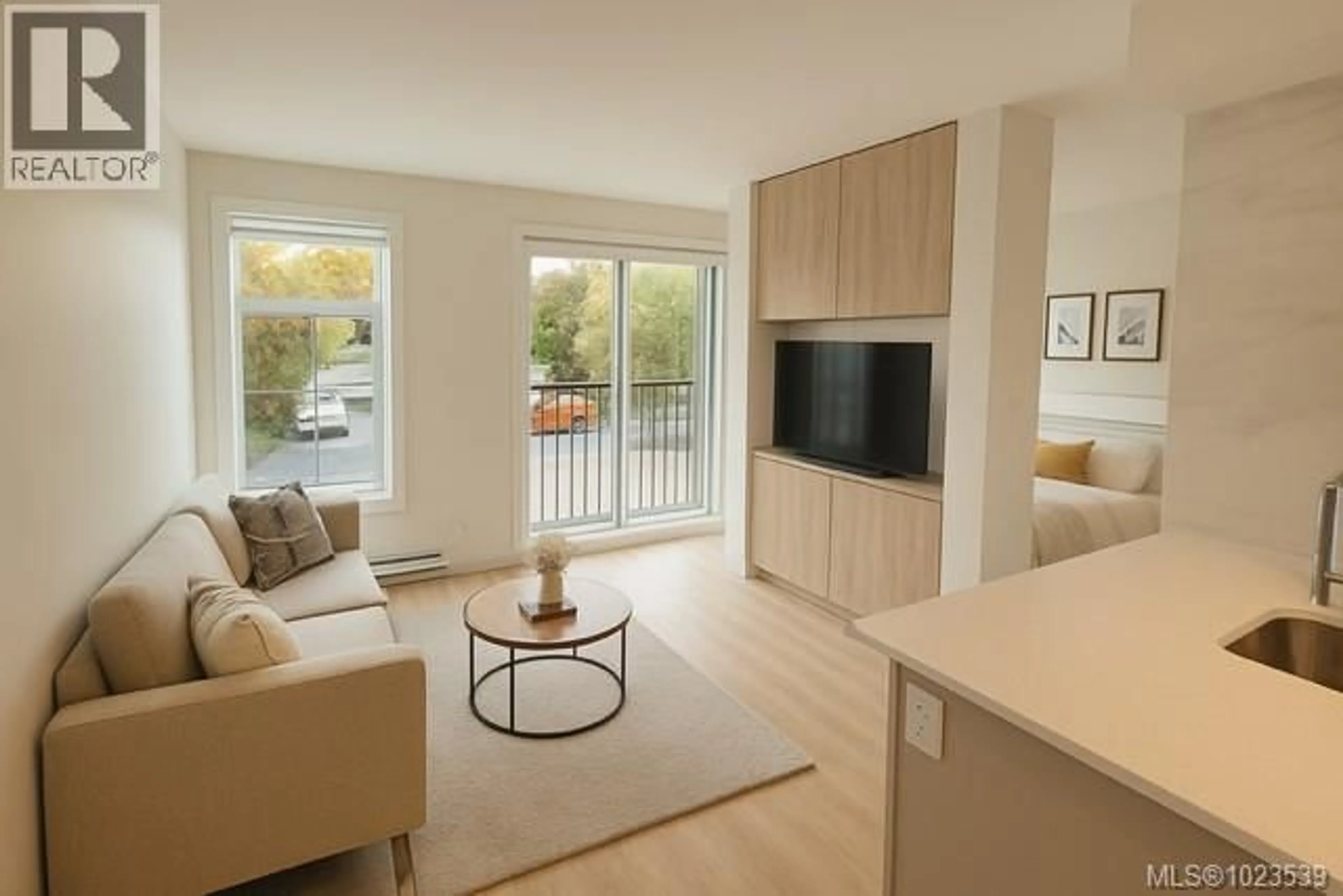 Living room with furniture, wood/laminate floor for 3103 - 4201 TYNDALL AVENUE, Saanich British Columbia V8N0C4