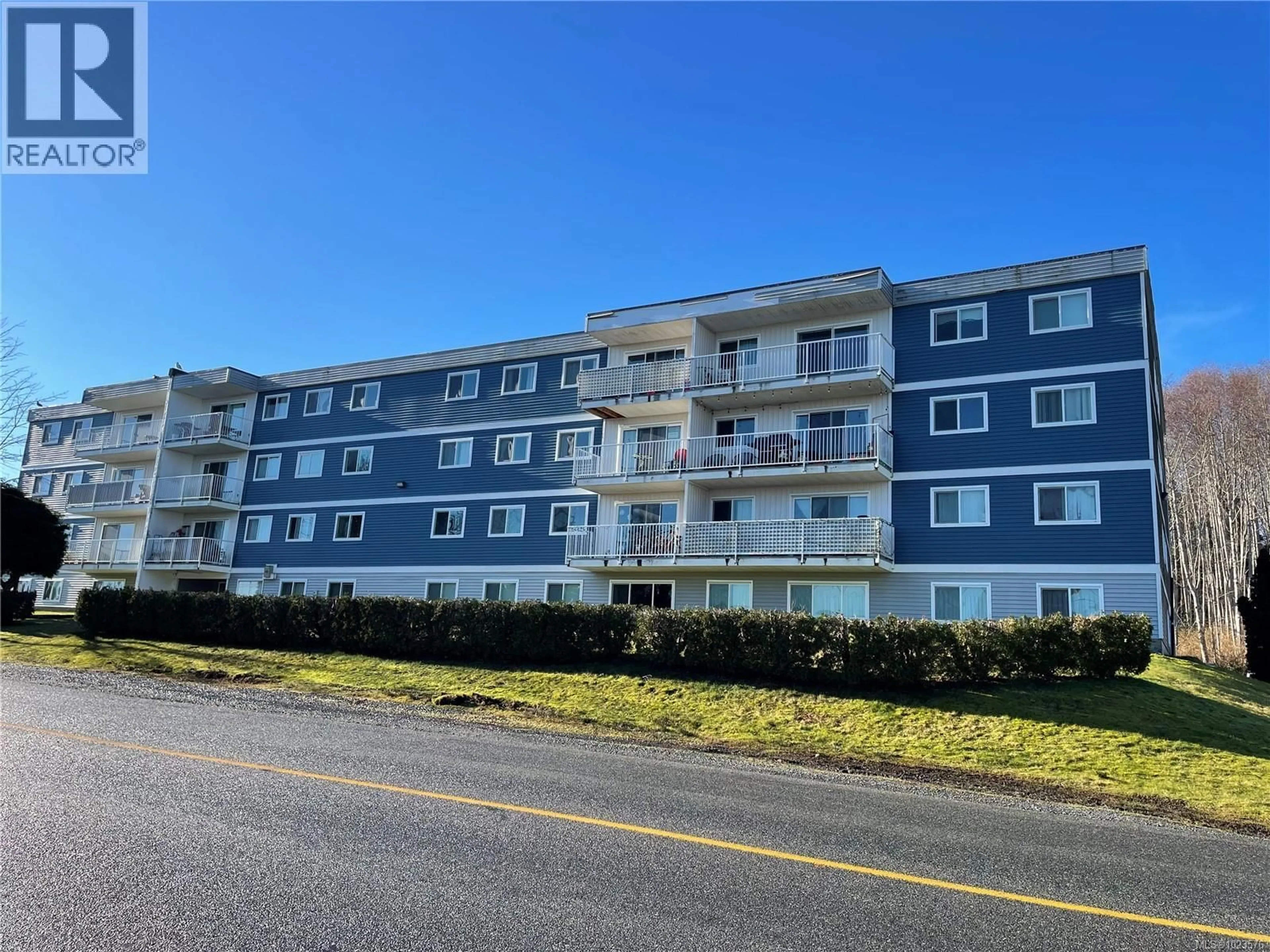 A pic from outside/outdoor area/front of a property/back of a property/a pic from drone, water/lake/river/ocean view for 403 - 7450 RUPERT STREET, Port Hardy British Columbia V0N2P0