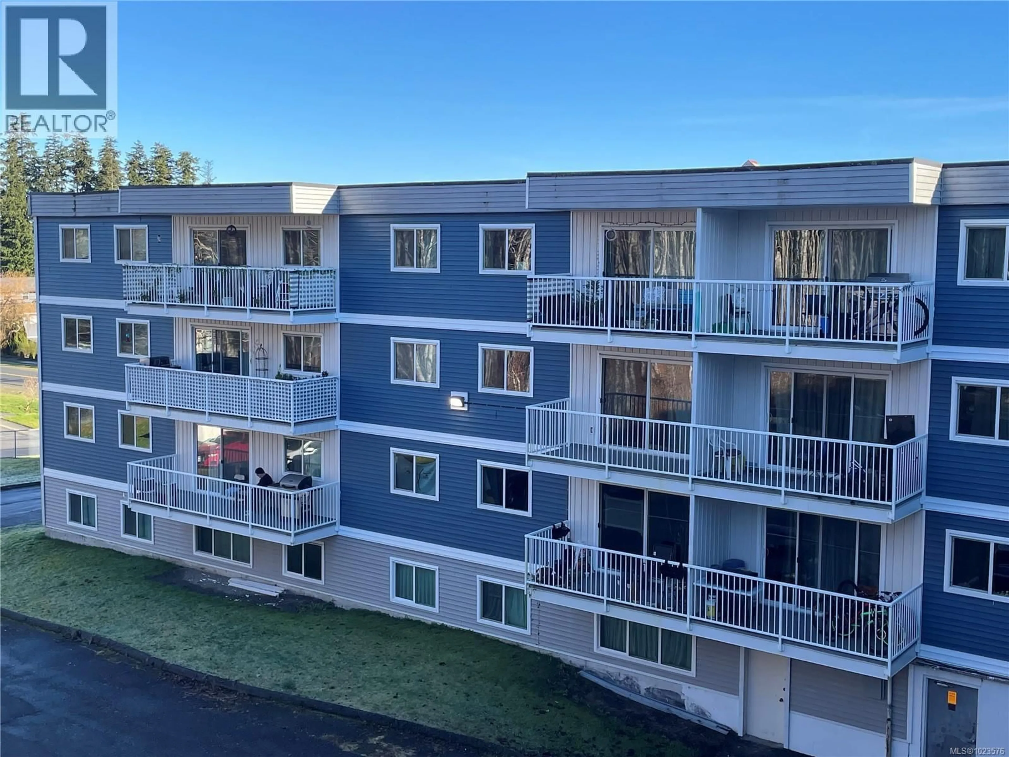 A pic from outside/outdoor area/front of a property/back of a property/a pic from drone, unknown for 403 - 7450 RUPERT STREET, Port Hardy British Columbia V0N2P0